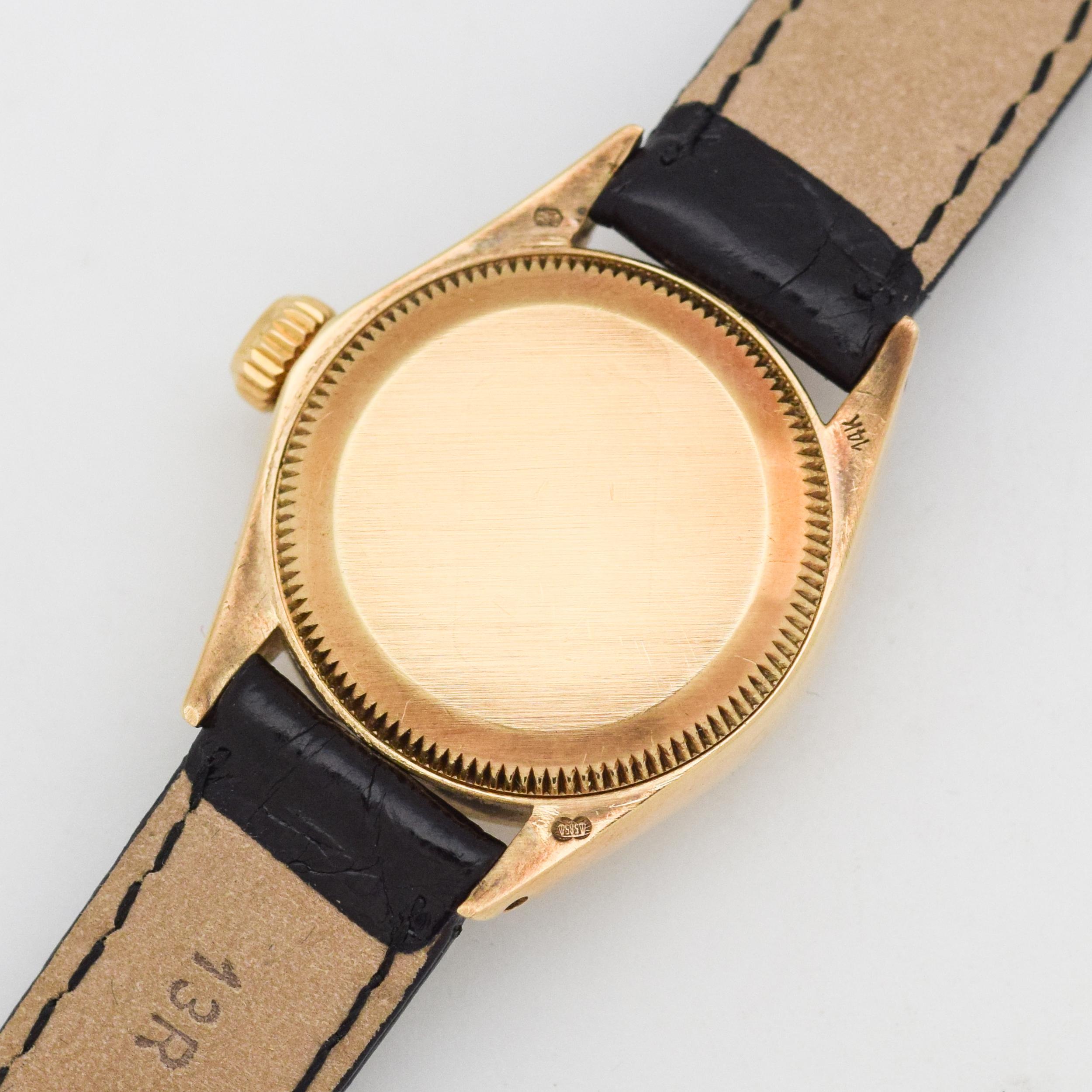 Vintage Rolex Ladies Oyster Perpetual Black Dial Watch In Excellent Condition For Sale In Beverly Hills, CA