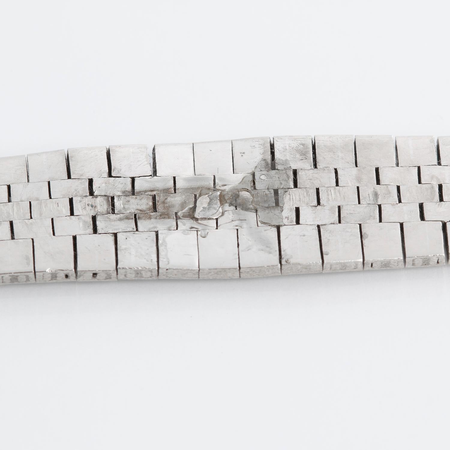 Vintage Rolex Orchid Chameleon 14K White Gold Ladies - Manual winding. 14K White gold case with slot through which bands can be interchanged (16 mm). Silver textured dial with gold stick markers. Original interchangeable straps with Rolex buckles ;