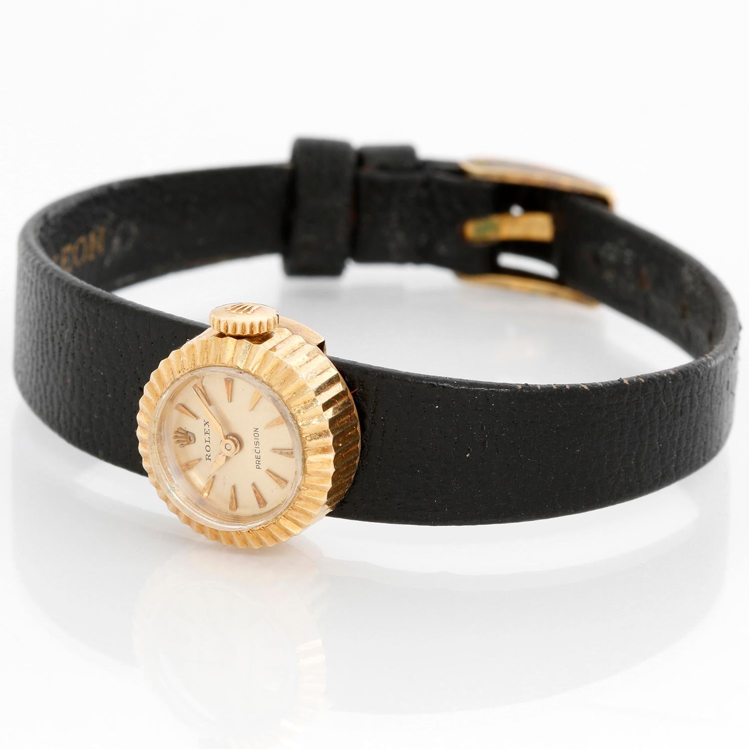 Vintage Rolex Orchid Chameleon Ladies Watch 8788 - Manual winding. 18k yellow gold case with slot through which bands can be interchanged (16mm diameter). Champagne dial with stick markers. Original interchangeable bracelets; Red, green, purple and