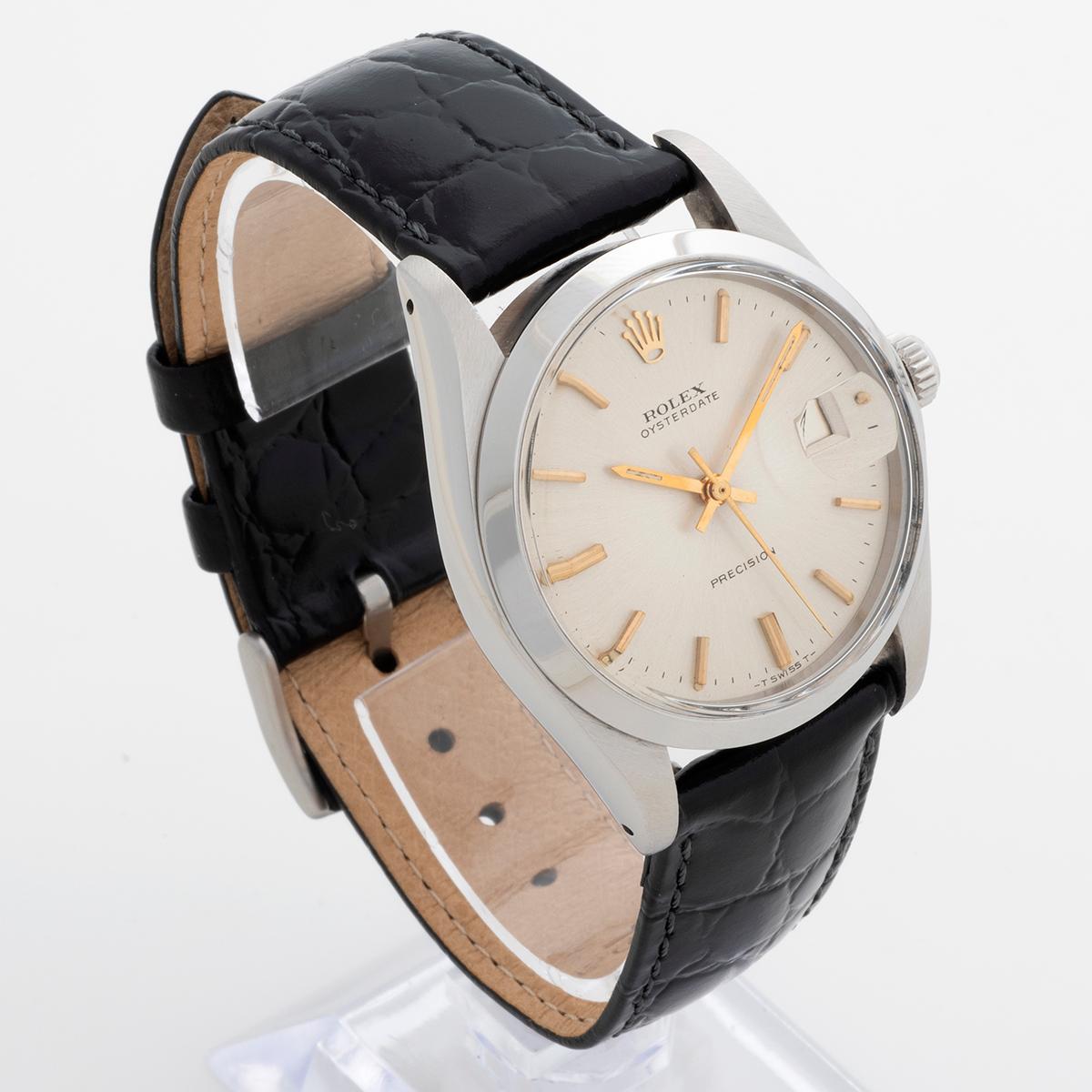 Our vintage manually wound Rolex Oyster Date Precision , reference 6694, is presented in excellent condition. The 34mm case has clearly visible serial, and our 6694 features a classic original silver dial with gilt batons and hands. A quality