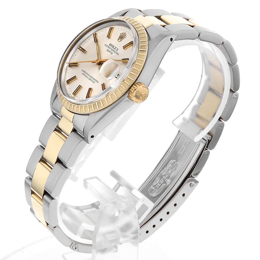 Discover a timeless classic with the Rolex Oyster Perpetual Date, model 1505, a harmonious blend of stainless steel and yellow gold that encapsulates the enduring elegance Rolex is known for. This distinguished men's watch features a silver dial