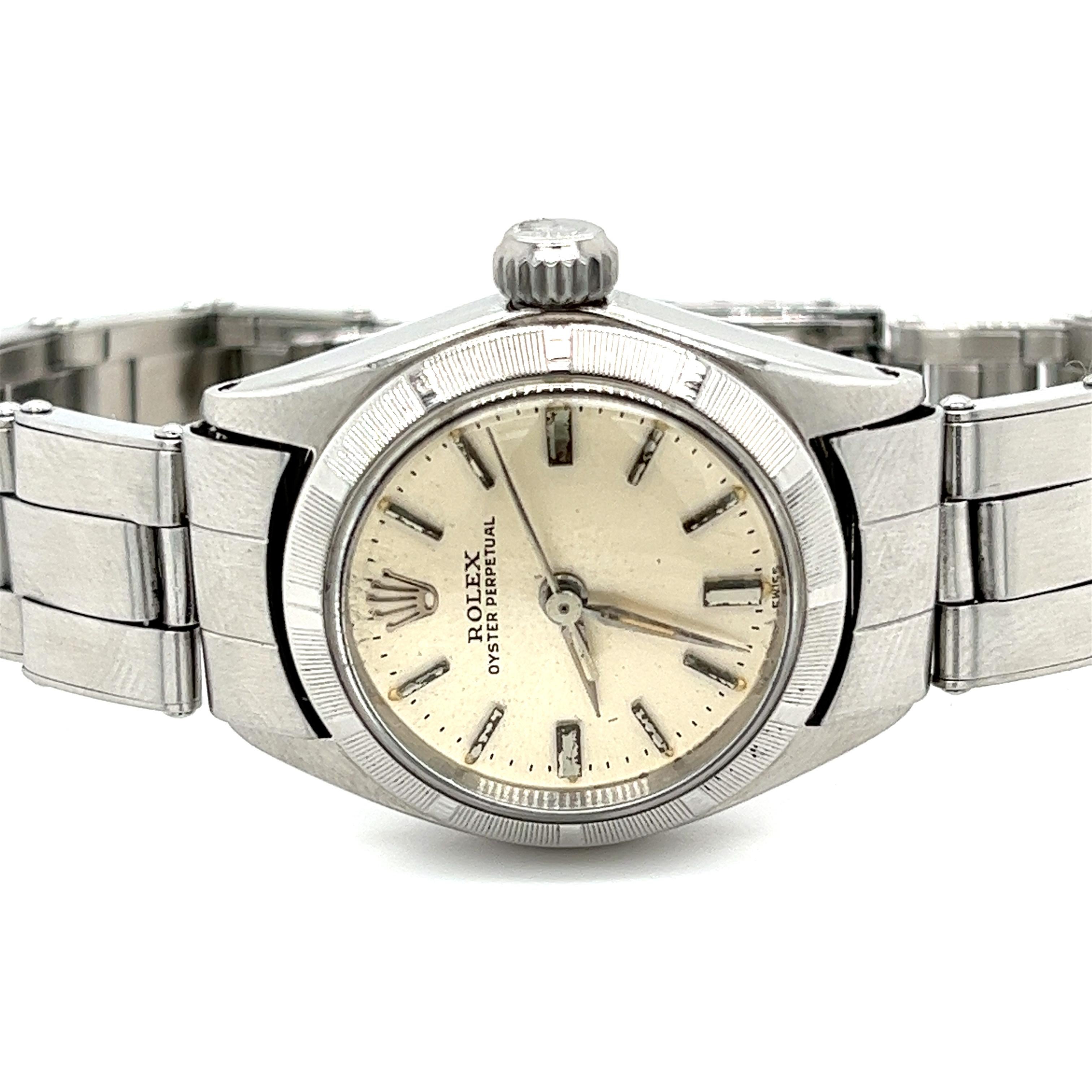 Women's Rolex 6623 Oyster Perpetual vintage ladies wrist watch in stainless steel. Featuring a vintage oyster bracelet, fold over clasp (deployment release), screw-down crown, and 26 jewels. 

A sleek, vintage timepiece for both the seasoned