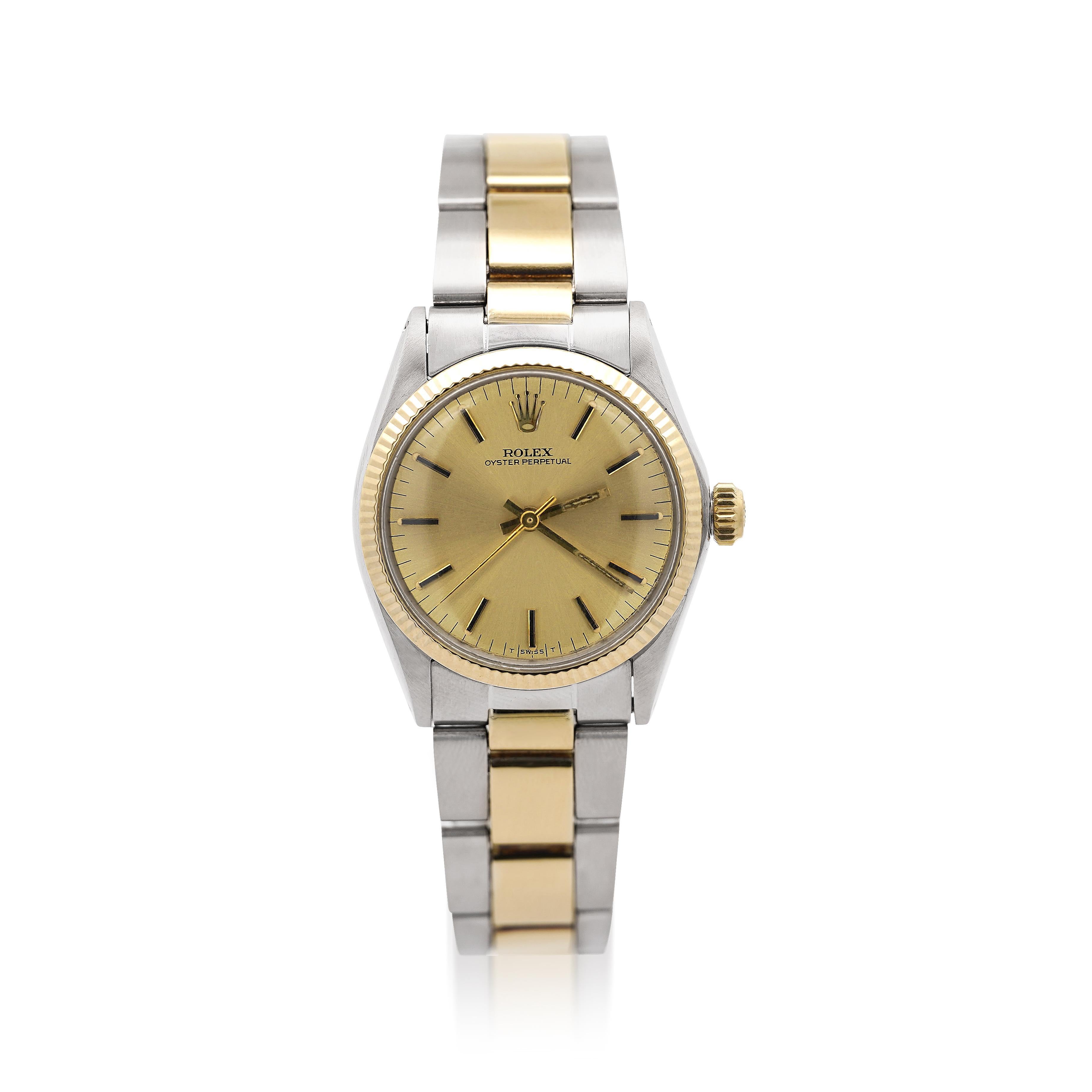 Montre Rolex Oyster Perpetual 6551 vintage bicolore en or 18 carats avec cadran champagne, 31 mm