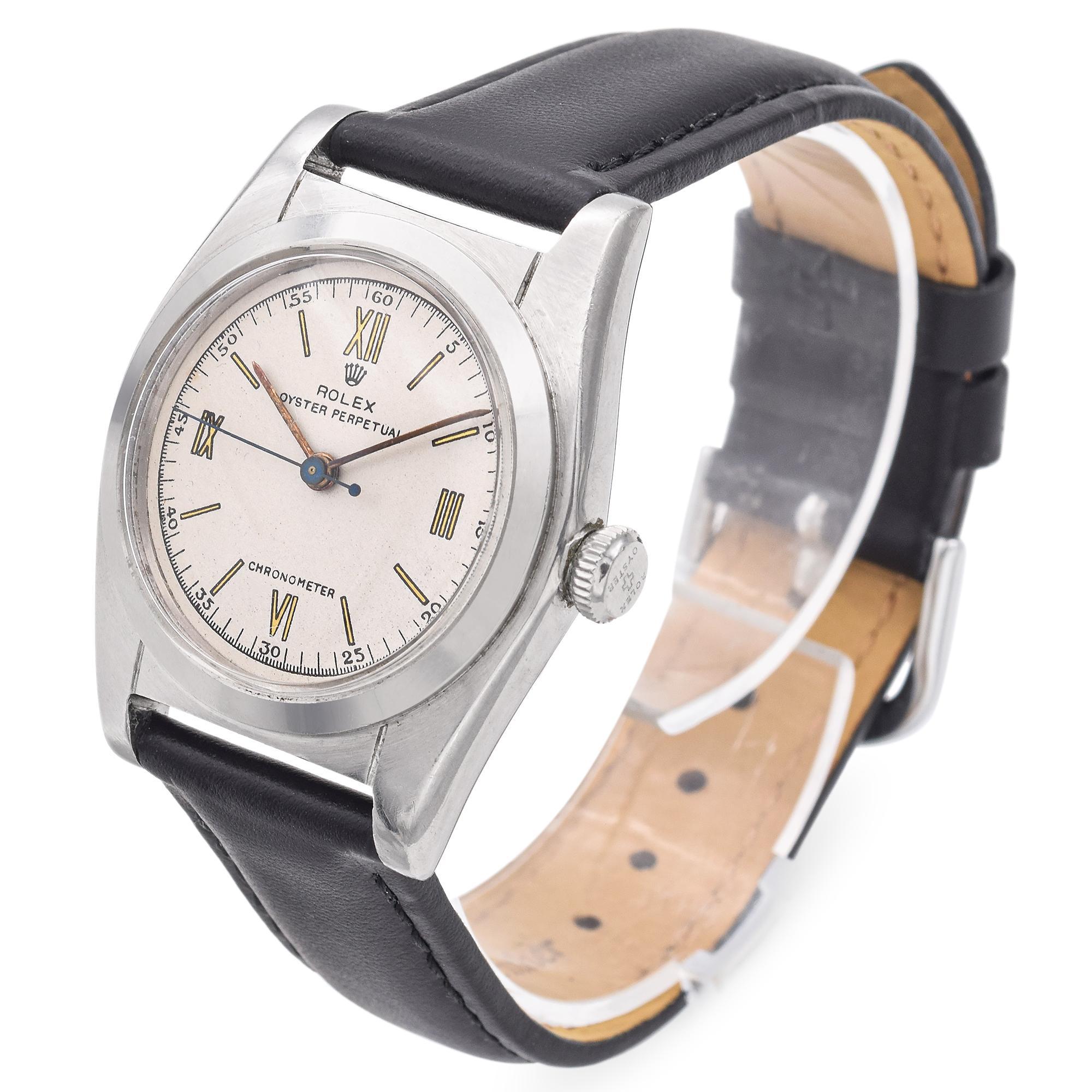 This 1940's Rolex Bubbleback reference 2940 represents one of the biggest jumps in the innovation of sports watches with its screw back case and automatic movement. It features a stainless steel case and leather strap. The case measures 31.5mm and