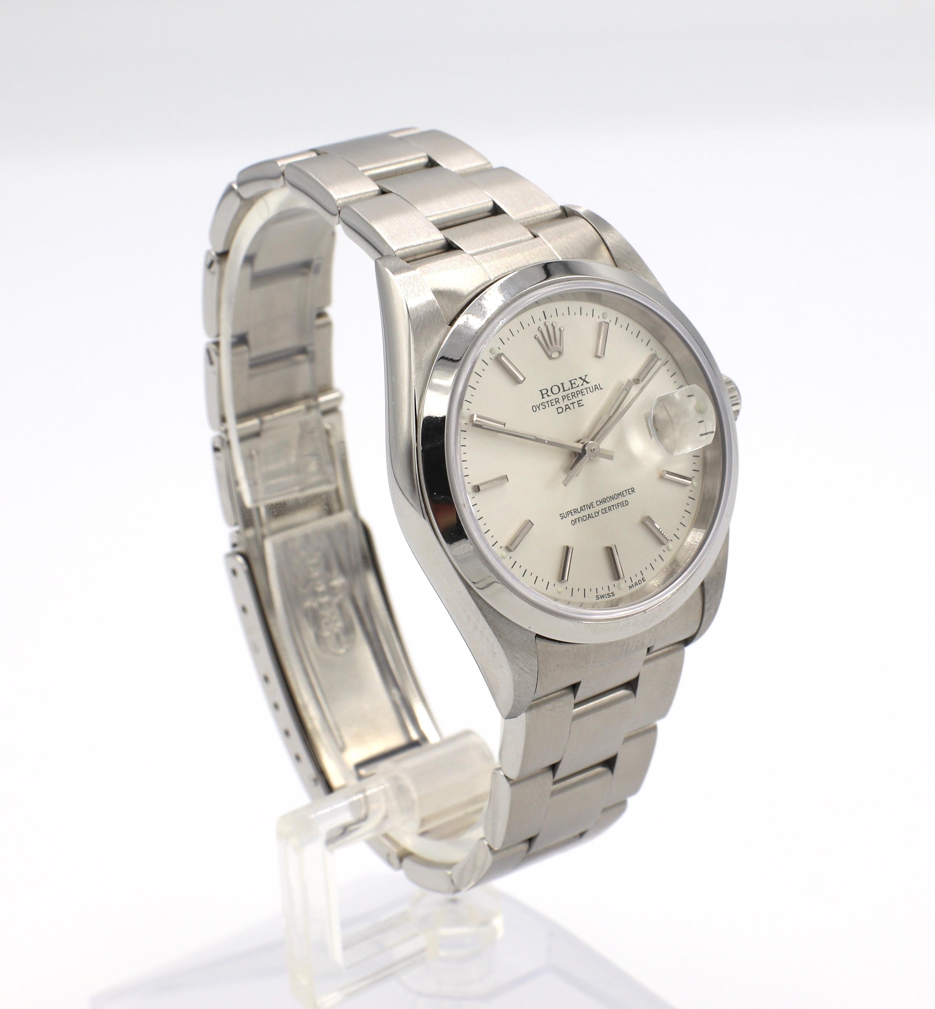 Vintage Rolex Oyster Perpetual Date Steel Watch Reference 15200 Box & Papers

Model: 15200
Serial: W815***
Metal: Stainless steel
Case diameter: 34mm
Dial: Silver
Crystal: Sapphire
Movement: Automatic 
Original Box & Papers (papers dated 1997)
