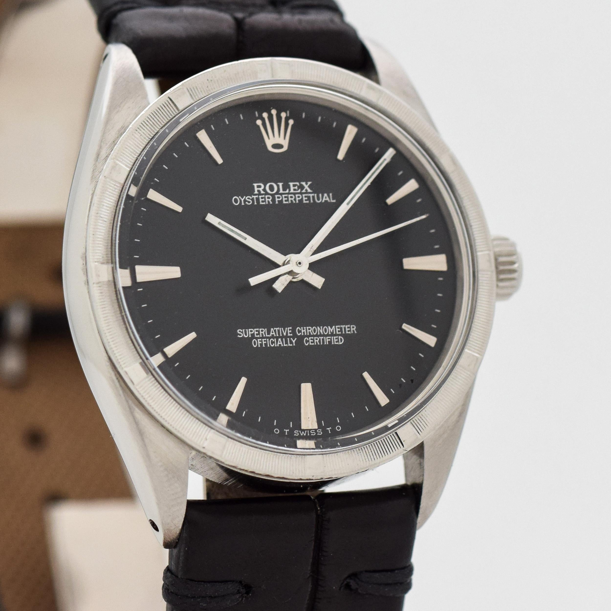 1966 Vintage Rolex Oyster Perpetual Automatic Ref. 1007 Stainless Steel watch with Machined Bezel with Original Black Sigma Dial with Applied 14k White Gold Beveled Tapered Stick/Bar/Baton Markers. 34mm x 38mm lug to lug (1.34 in. x 1.5 in.) - 26