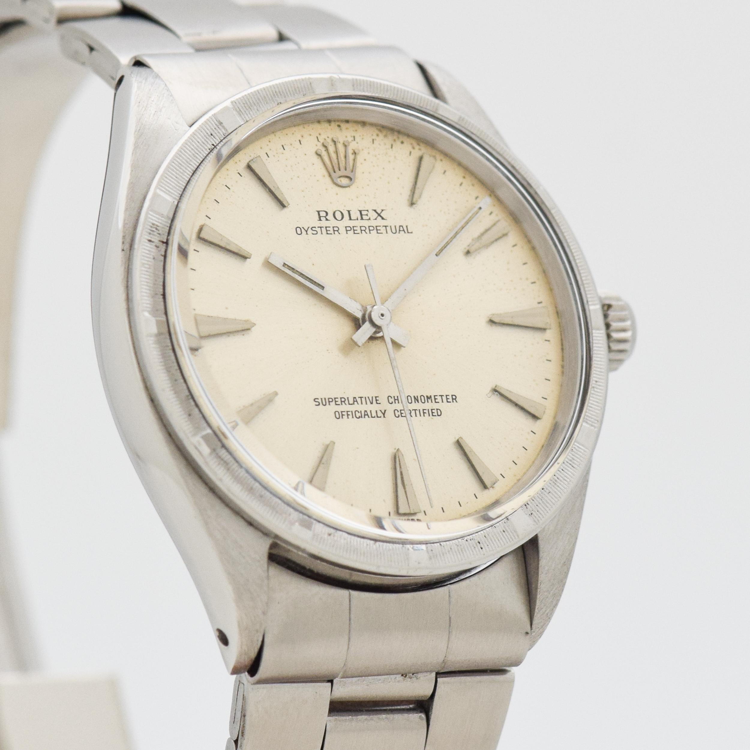 1961 Vintage Rolex Oyster Perpetual Ref. 1007 Stainless Steel watch with Original Silver Dial with Applied Steel Elongated Arrow Beveled Markers with Original Rolex Oyster Stainless Steel Bracelet. 34mm x 39mm lug to lug (1.34 in. x 1.54 in.) - 25