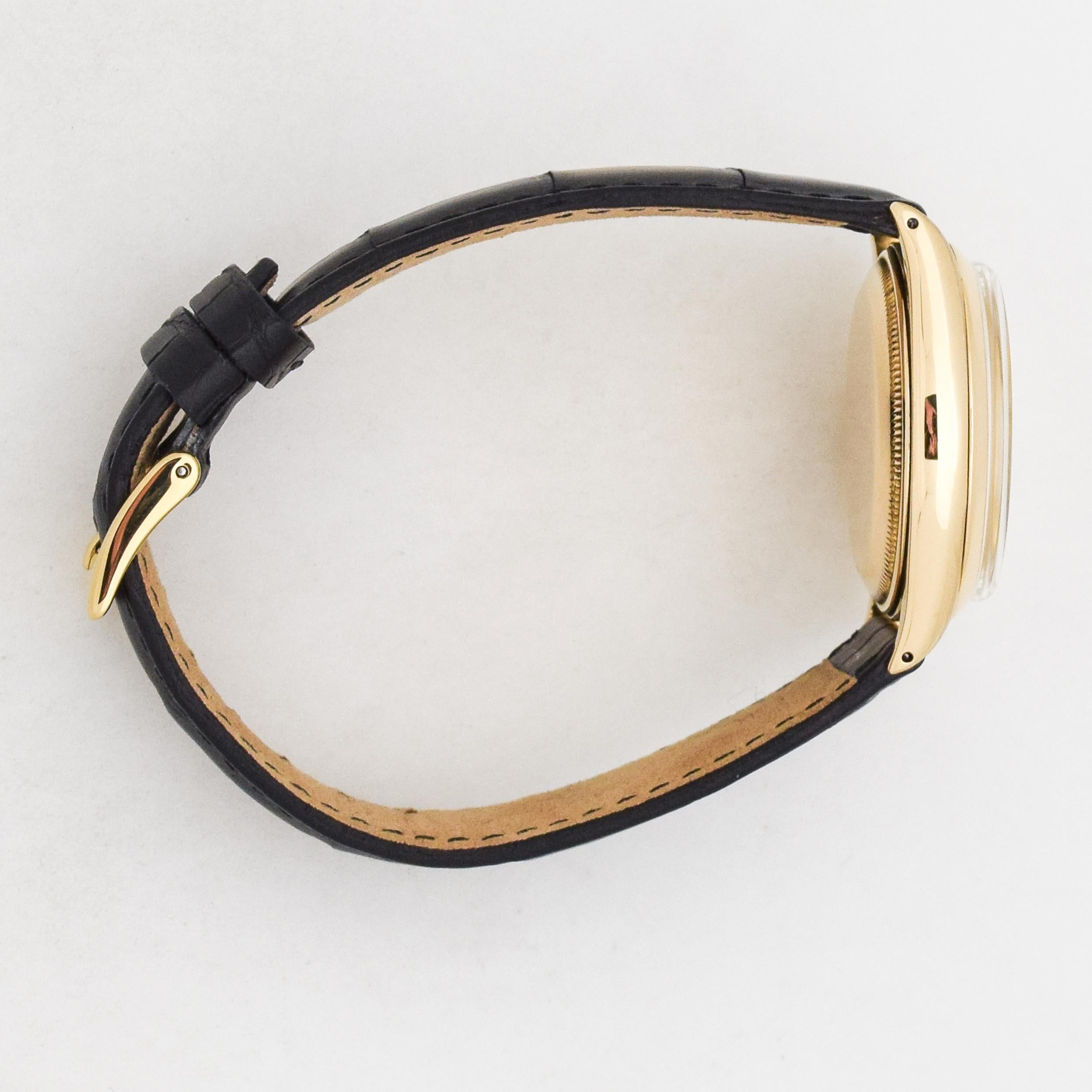 Women's or Men's Vintage Rolex Oyster Perpetual Reference 6564 with an 18 Karat Gold Case, 1955