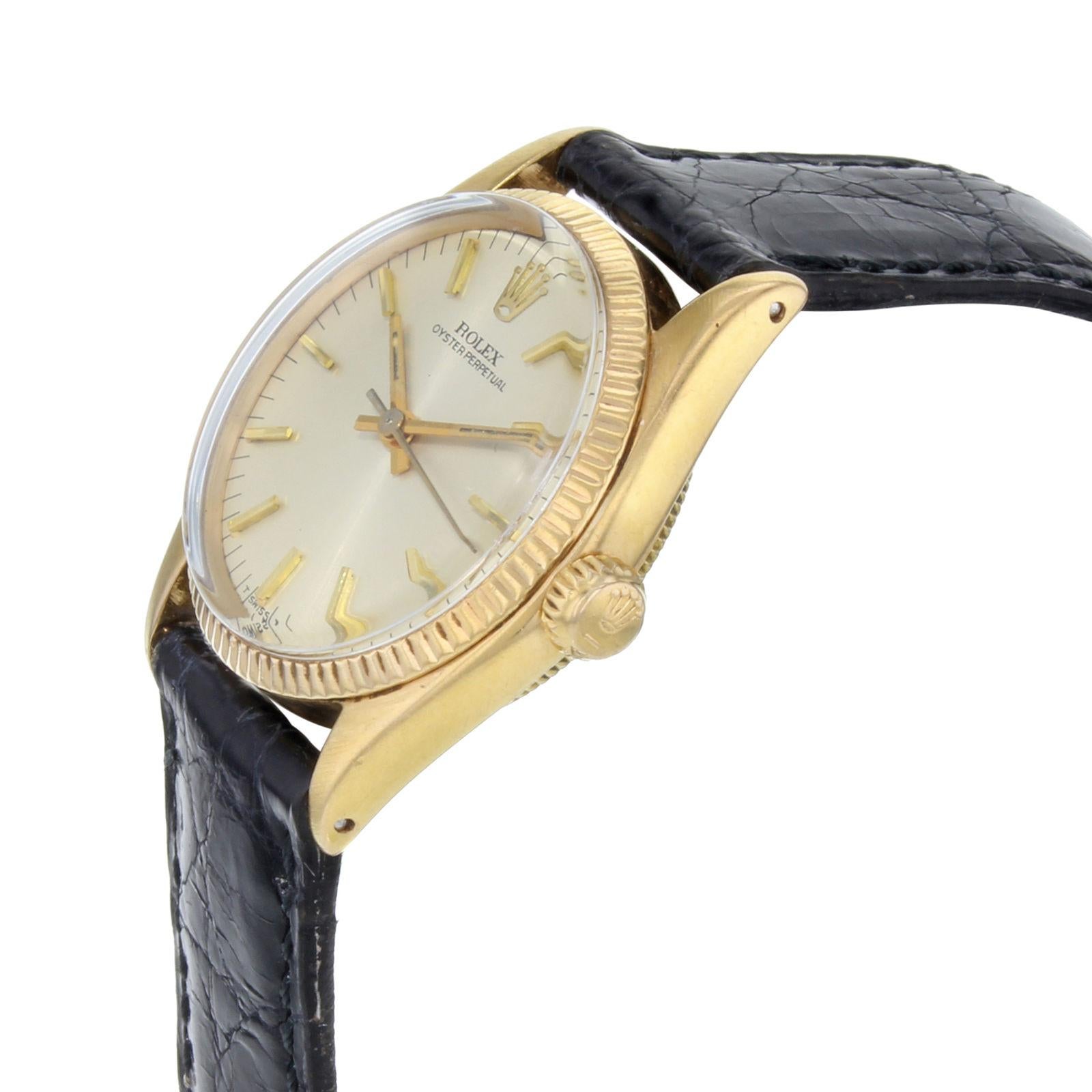 (15567)
This pre-owned Rolex Oyster Perpetual 6551 is a beautiful Womens timepiece that is powered by an automatic movement which is cased in a yellow gold case. It has a round shape face, no features dial and has hand sticks style markers. It is