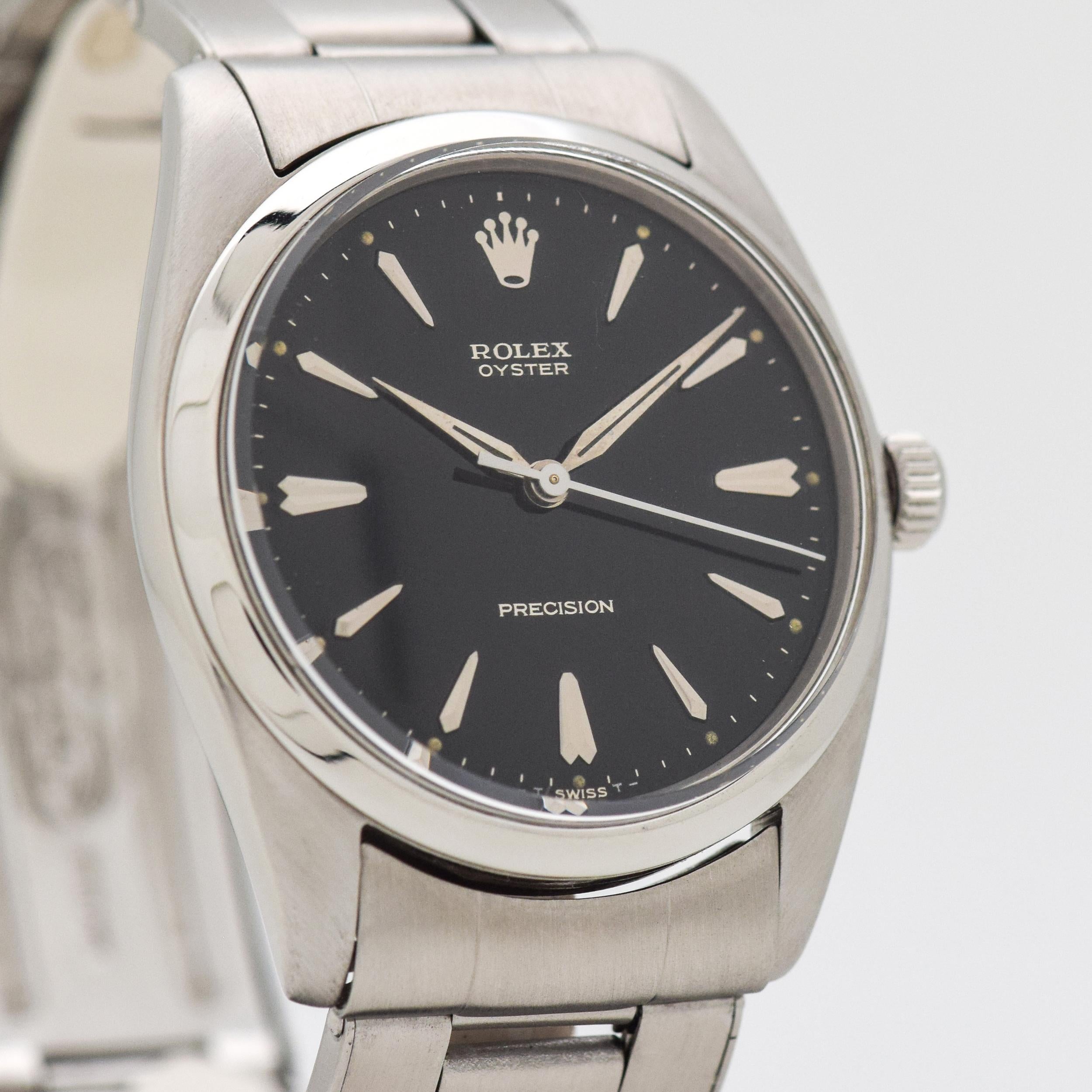 1958 Vintage Rolex Oyster Precision Ref. 6424 Stainless Steel watch with Black Dial with Applied Steel Beveled Pointed Tapering Markers. Case size, 35mm x 42mm lug to lug (1.38 in. x 1.65 in.) - Powered by a 17-jewel, manual caliber movement. Triple
