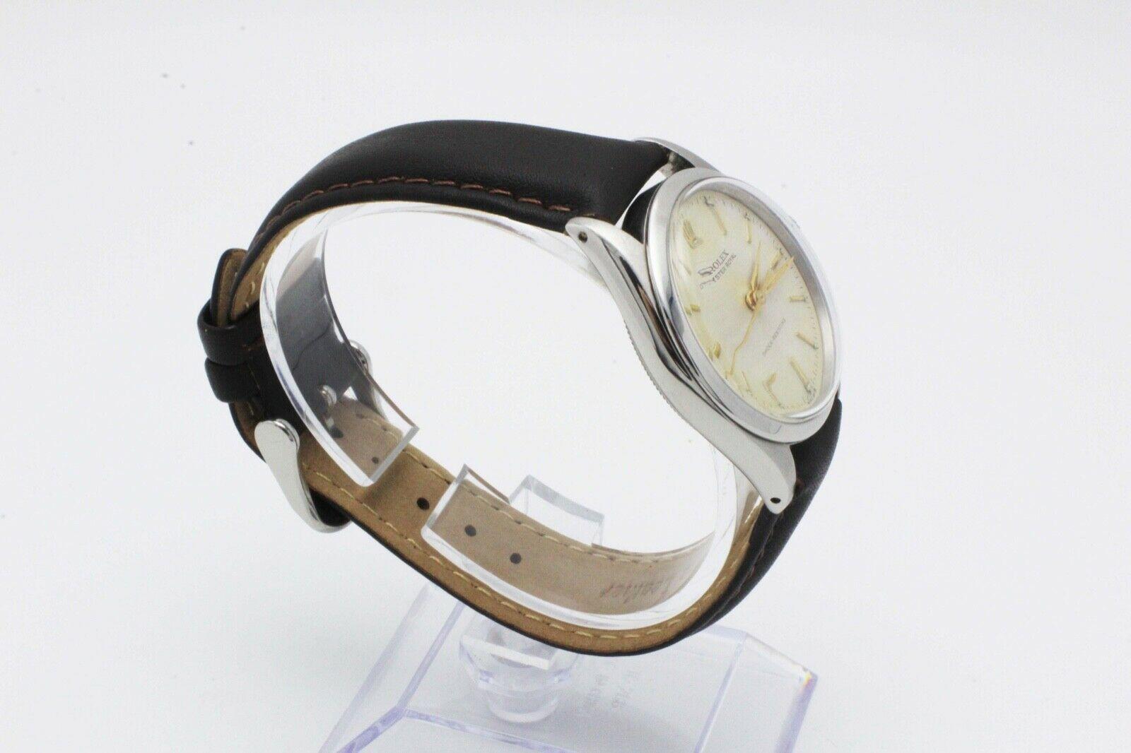 Style Number: 6444

 

Serial: 205***

 

Model: Oyster Royal

             

Case Material: Stainless Steel

 

Band: Custom Leather Band 

 

Bezel: Stainless Steel 

 

Dial: Ivory 

 

Face: Acrylic

 

Case Size: 31mm

 

Includes: 

-Elegant