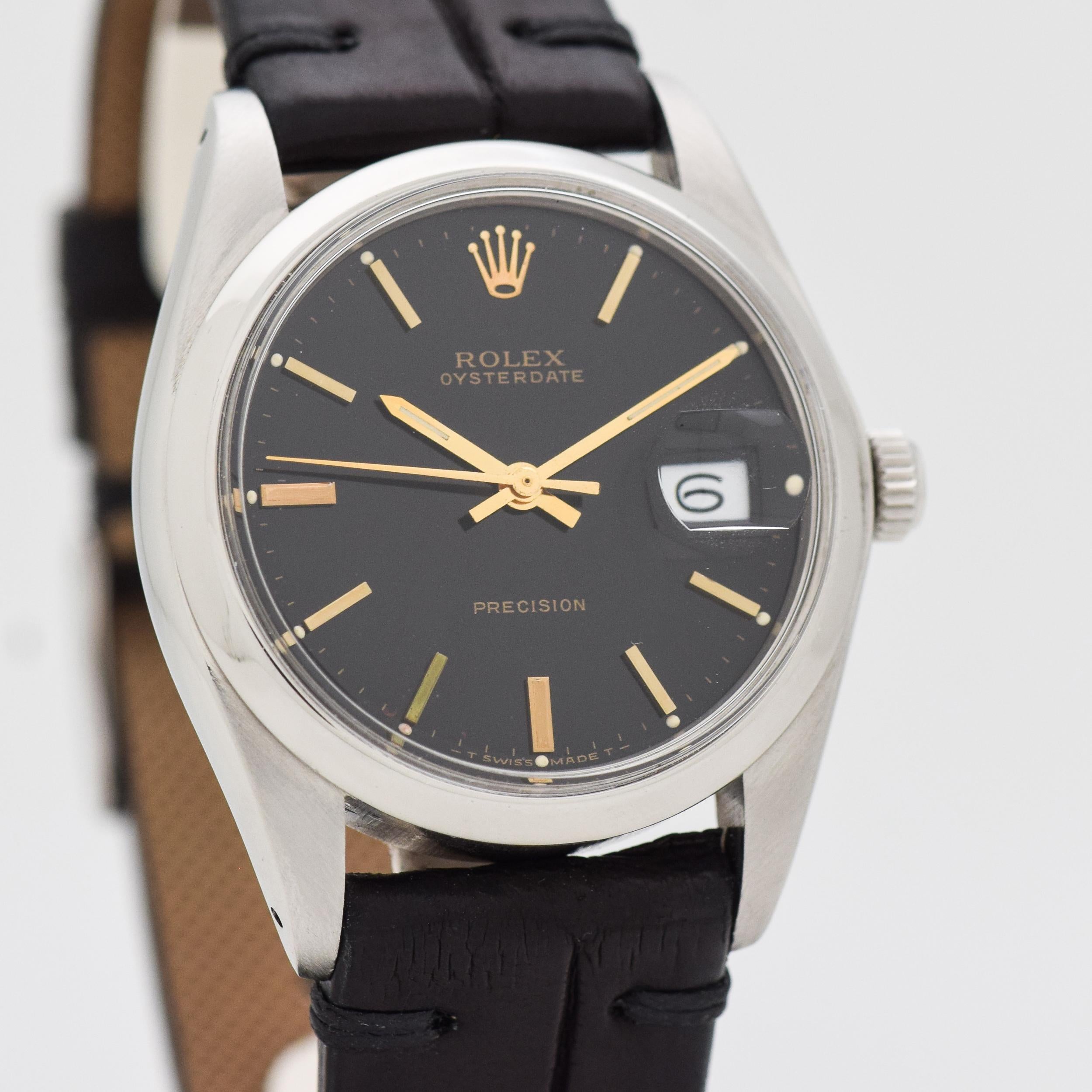 1972 Vintage Rolex Oysterdate Ref. 6694 Stainless Steel watch with Original Black Dial with Applied Gold Color Stick/Bar/Baton Markers. Case size, 34mm x 41mm lug to lug (1.34 in. x 1.61 in.) - Powered by a 17-jewel, manual caliber movement. Triple