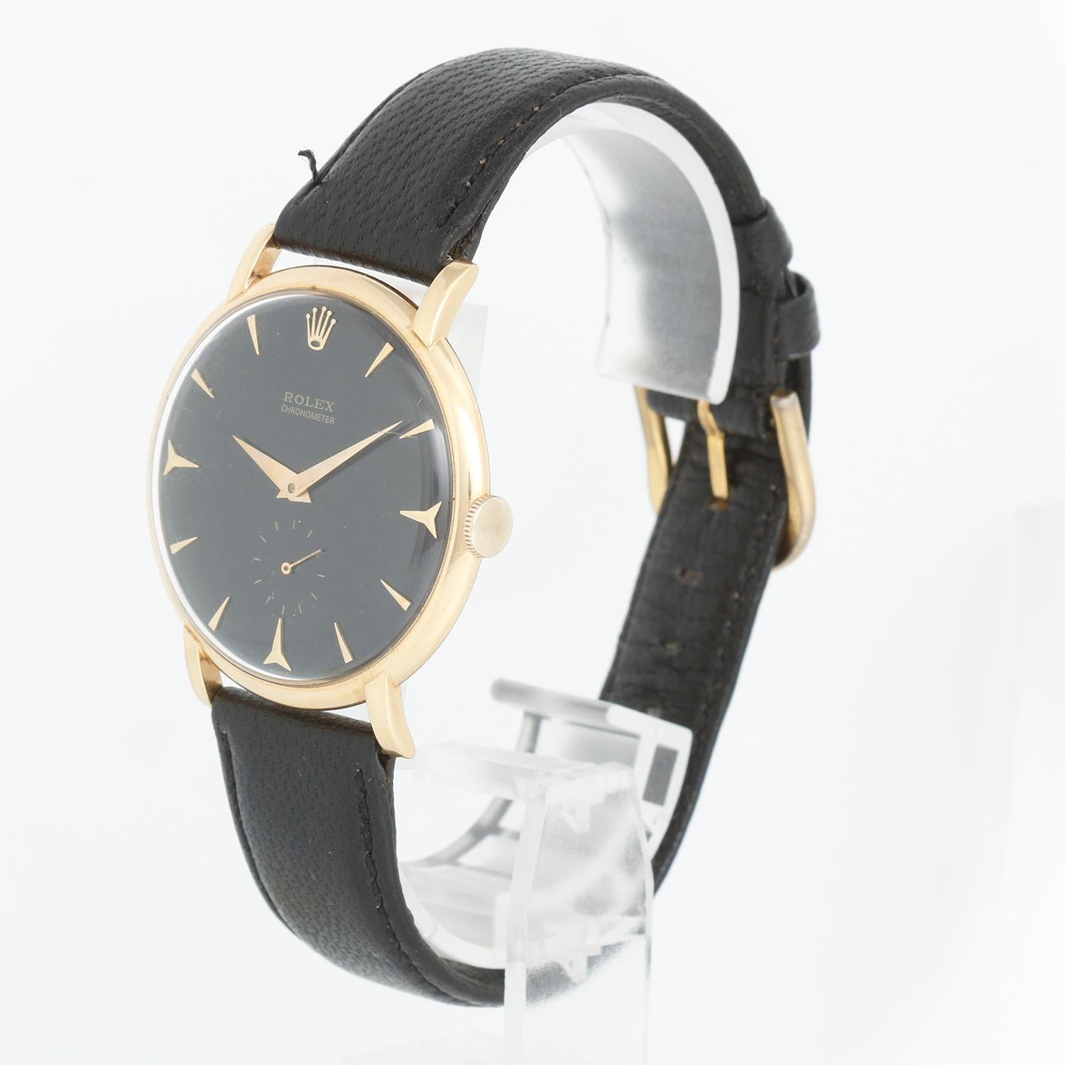 Vintage Rolex Precision 18k Yellow Gold Men's Watch Ref 9082 - Manual winding, acrylic crystal. 18k yellow gold case (36mm). Black dial with gold stick markers. Black Rolex band with tang buckle. Pre-owned custom box. #63837