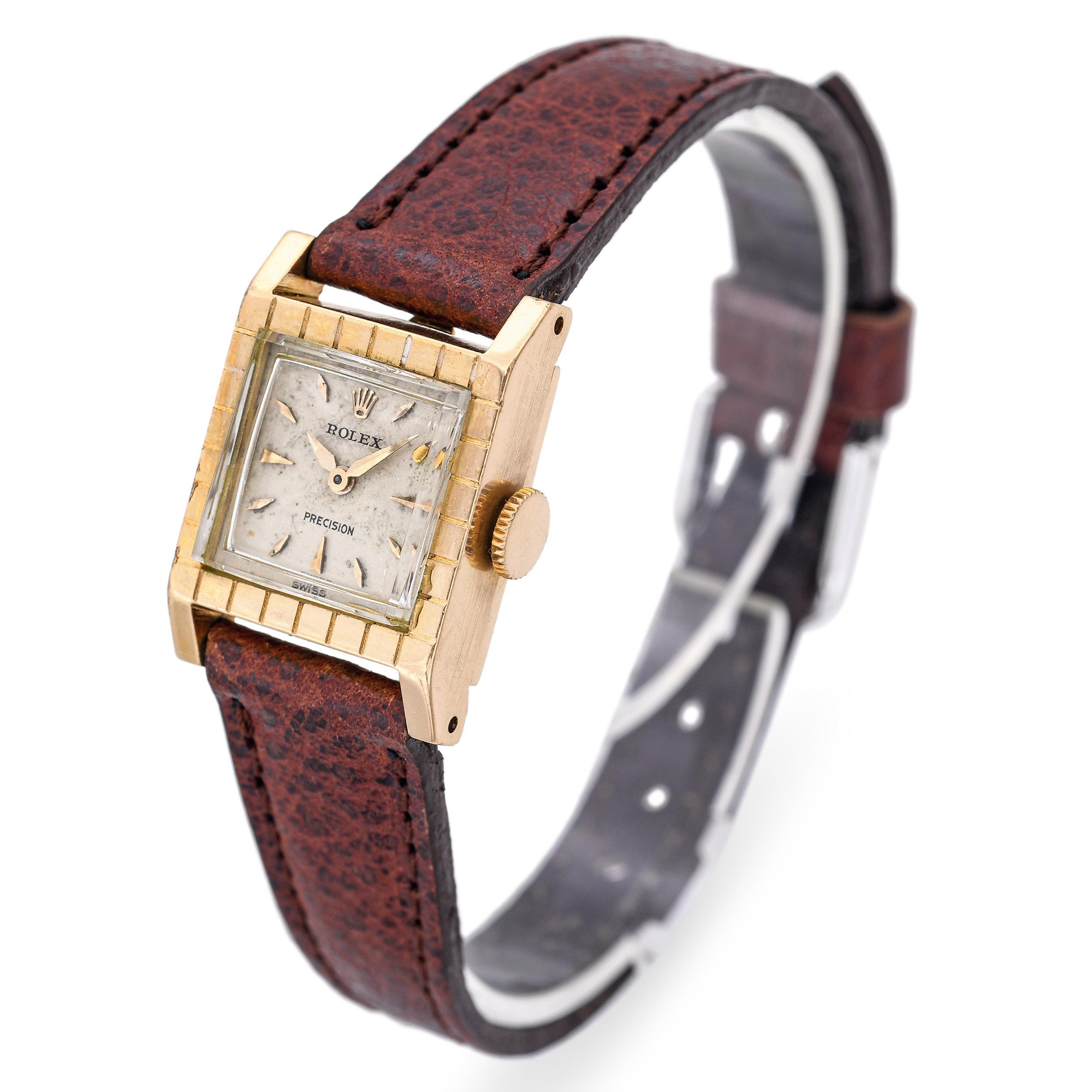 This vintage Rolex Precision Ref. 8320 is a refined ladies’ timepiece crafted in solid 18k yellow gold. Its petite, elegant case measures approximately 23mm, making it ideal for formal or everyday wear. The minimalist champagne dial features slim