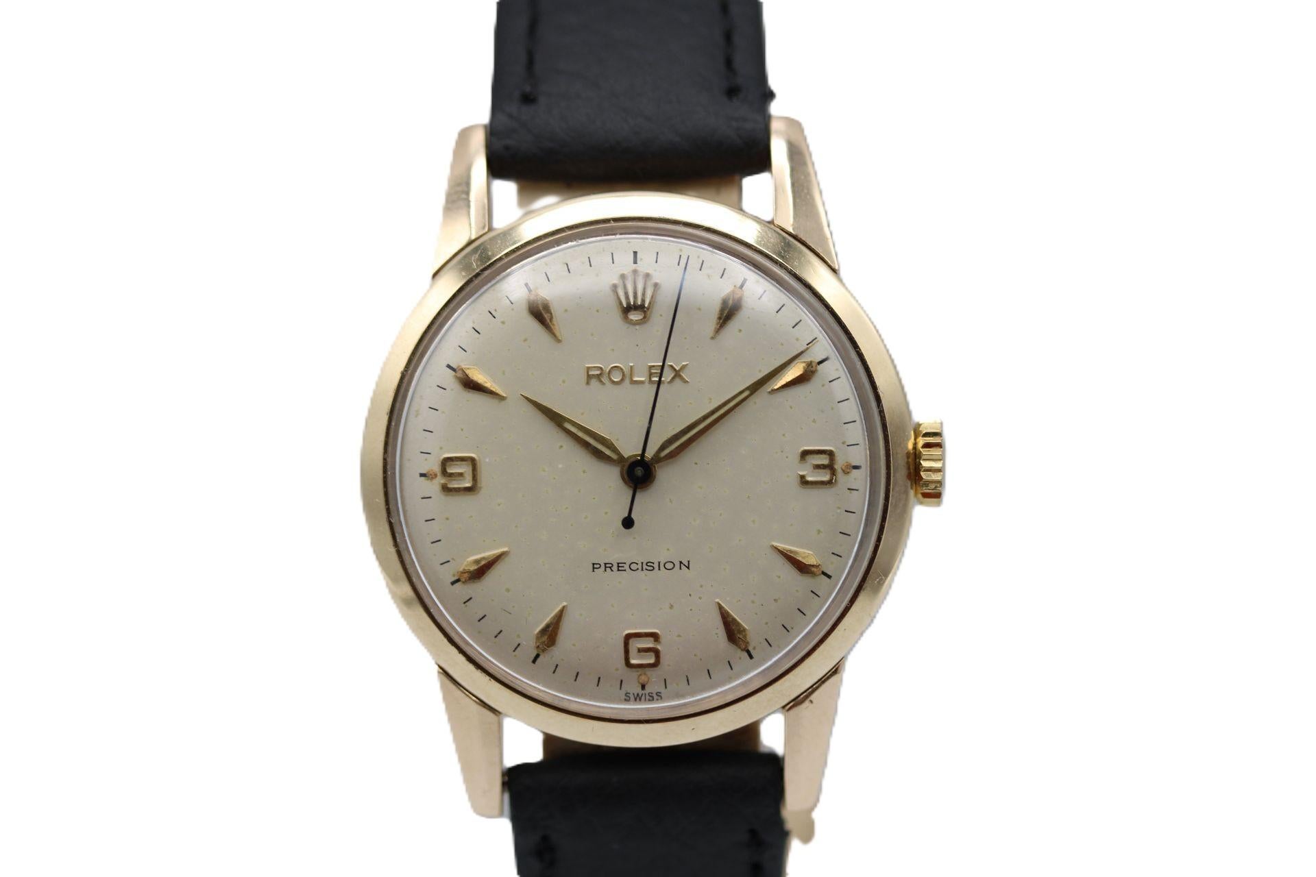 Vintage Rolex Precision  9ct Yellow Gold  Manual Wind  1960s  Serviced

A beautifully preserved vintage 1960s Rolex Precision in 9ct yellow gold, this classic dress watch showcases timeless elegance with authentic vintage charm. Recently serviced