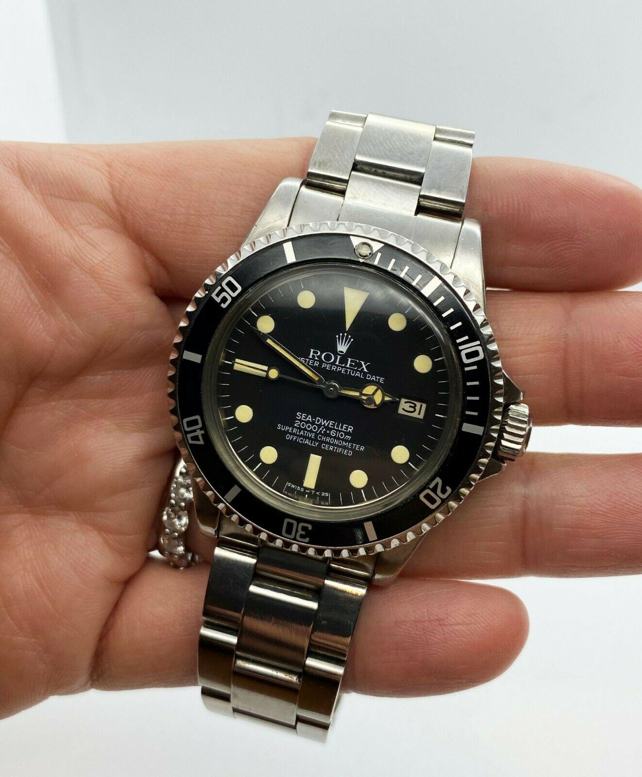 Style Number: 1665

 

Serial: 6752***


Year: 1981

 

Model: Sea Dweller

 

Case Material: Stainless Steel

 

Band: Stainless Steel

 

Bezel:  Stainless Steel

 

Dial: Black

 

Face: Acrylic

 

Case Size: 40mm

 

Includes: 

-Elegant Watch