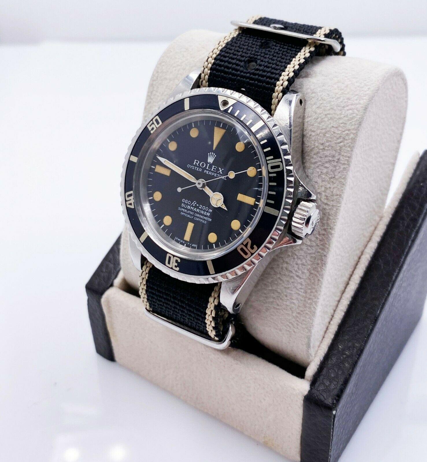 Style Number: 5512

 

Serial: 3443***


Year: 1973

 

Model: Submariner 

 

Case Material: Stainless Steel

 

Band: Custom Nato Strap 

 

Bezel:  Black 

 

Dial: Matte Black Pumpkin Dial  4 Line 

 

Face: Acrylic 

 

Case Size: 40mm

