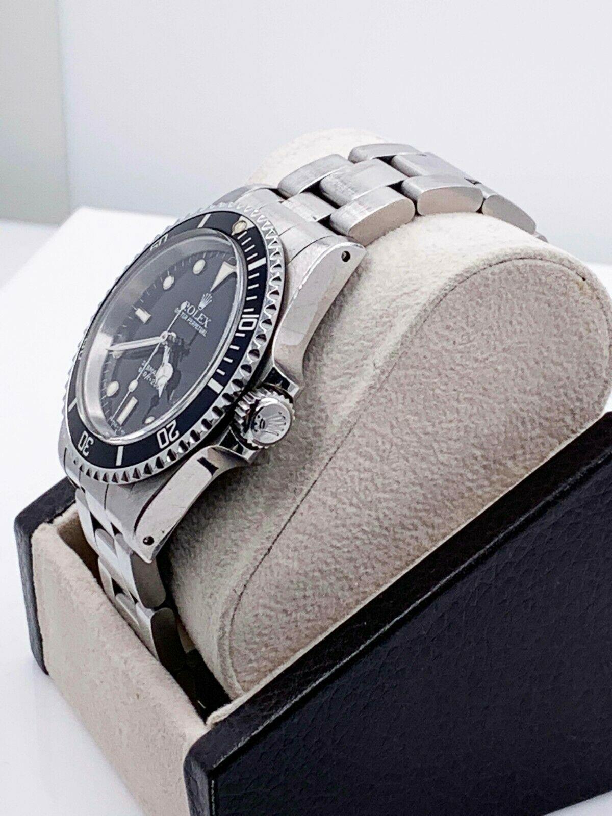 Style Number: 5513

 

Serial: R929***


Year: 1988

 

Model: Submariner

 

Case Material: Stainless Steel

 

Band: Stainless Steel

 

Bezel: Black

 

Dial: Black

 

Face: Acrylic

 

Case Size: 40mm

 

Includes: 

-Elegant Watch