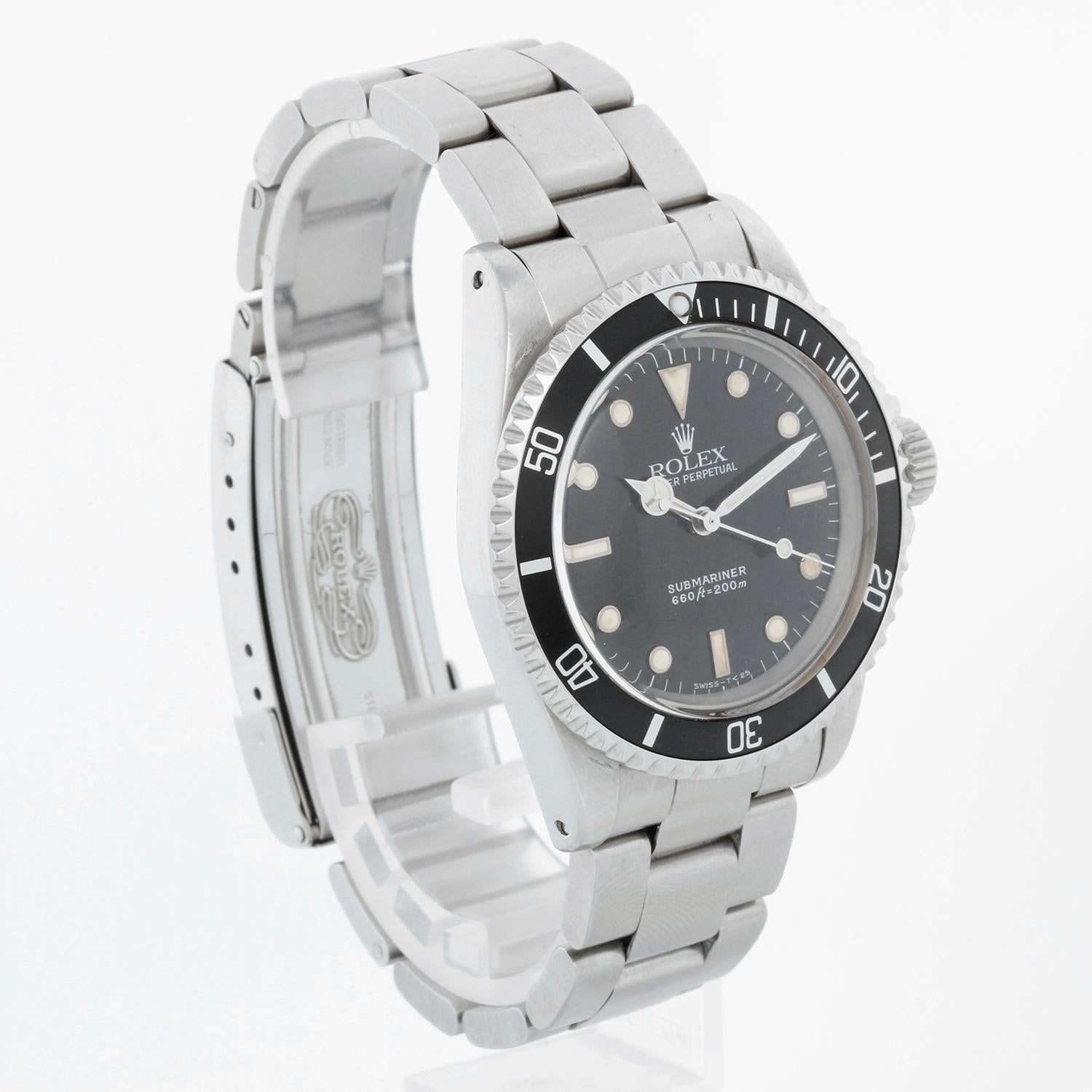 Vintage Rolex Submariner Black Dial Men's Automatic Watch 5513 - Automatic winding; acrylic crystal. Stainless steel case (41mm diameter). Black dial. Rolex Stainless Steel Oyster bracelet with flip-lock clasp. Pre-owned with Rolex box and books.