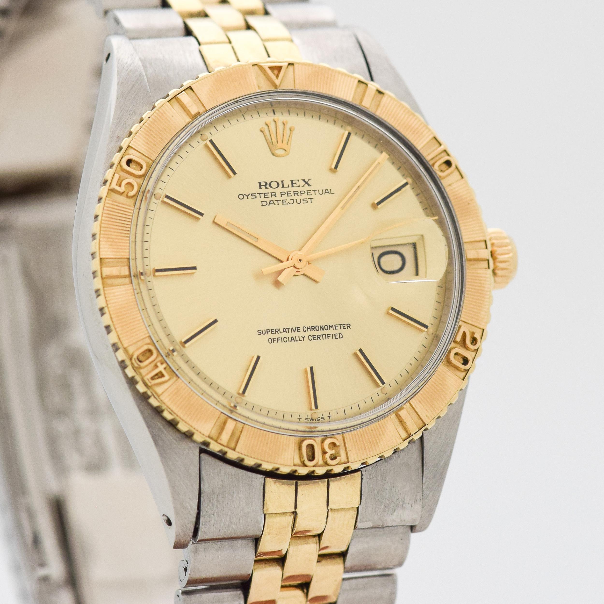 1972 Vintage Rolex Thunderbird Turn-O-Graph Bezel Datejust Ref. 1625 Two Tone 14k Yellow Gold and Stainless Steel watch with Original Champagne Dial with Attached Gold Color Stick/Bar/Baton Markers with Black Inlay with Original Rolex Two Tone 14k