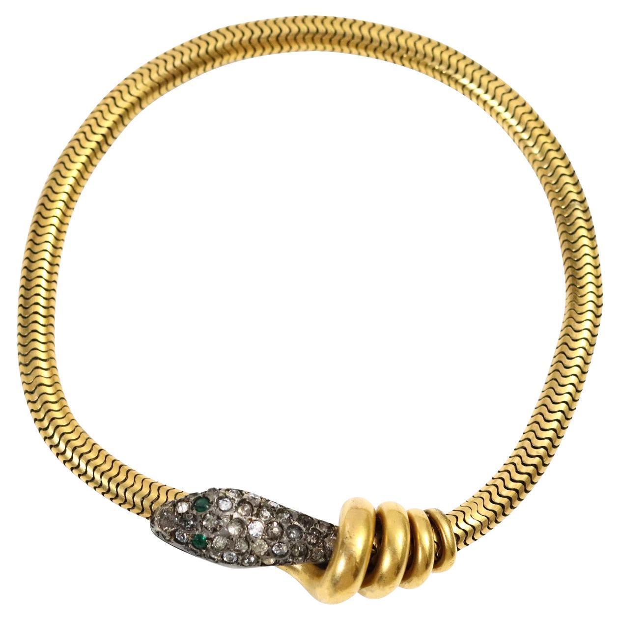 Vintage Rolled Gold Tone Diamante Dangling Snake Bracelet Circa 1940s.  I have never seen another bracelet like this. It is so special and unusual. There are $ rolls of descending sizes that have a snake head that is encrusted in black diamante with