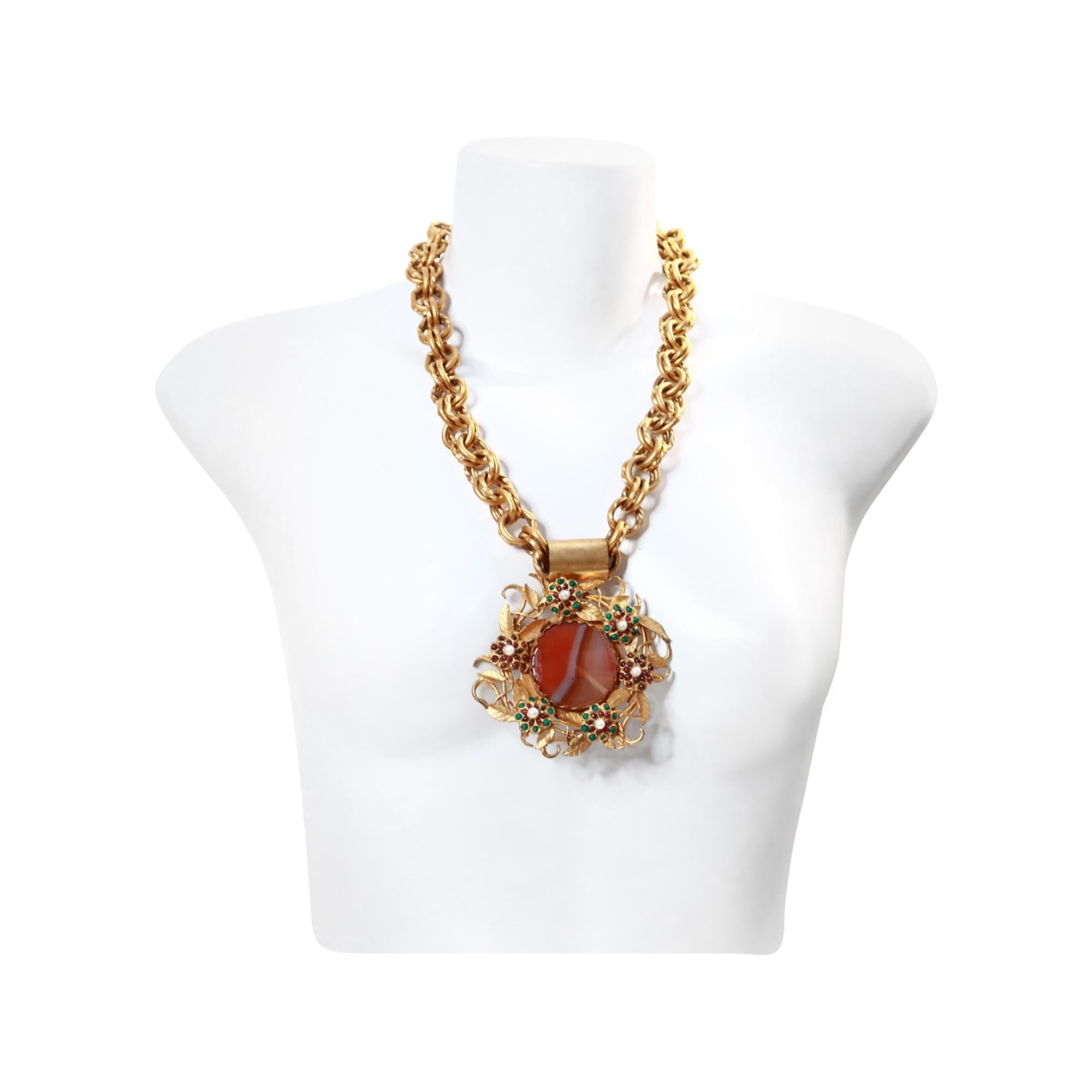 Vintage Rolled Gold With Cabochons Necklace Circa 1960s. Again, this is one of the most gorgeous necklaces I have in the collection. The work on this 60-year-old necklace is stunning. The small flowers sit atop beautiful leaves. This is a heavy and