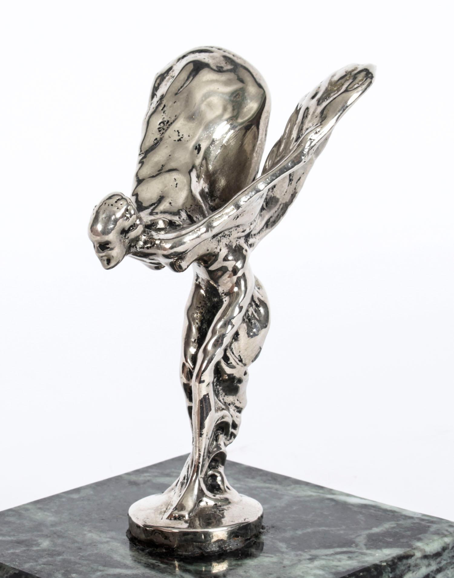 A beautiful vintage decorative Rolls Royce silver plated car mascot, The Spirit of Ecstasy dating from the mid 20th century.

The winged maiden was designed by Charles Robinson Sykes (1875-1950), and she stands on an attractive square verde antico