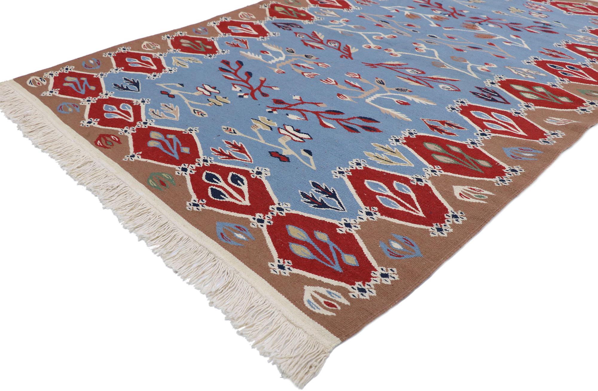 78048 Vintage Romanian Bessarabian Kilim rug with Folk Art Style 04'01 x 05'11. Delicately feminine and beautifully traditional, this hand-woven wool vintage Romanian floral kilim rug is poised to impress. The sky blue abrashed field features an