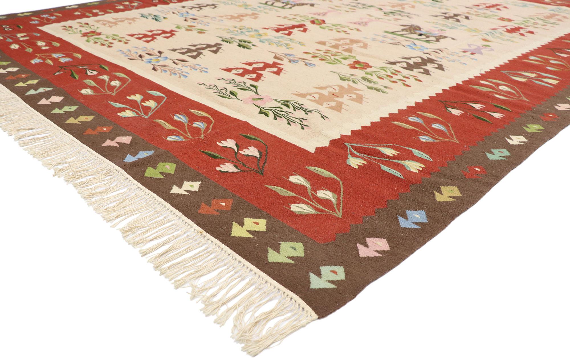 77920 vintage Romanian Kilim rug with Folk Art style 09'00 x 11'09. Full of tiny details and a bold expressive design combined with folk art style, this hand-woven wool vintage Romanian kilim rug is a captivating vision of woven beauty. The abrashed