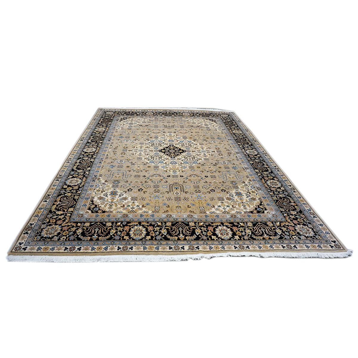 Ashly Fine Rugs presents a 21st century Romanian Tabriz. Tabriz is a northern city in modern-day Iran and has forever been famous for the fineness and craftsmanship of its handmade rugs. This piece is a Romanian Tabriz, which means it was handmade