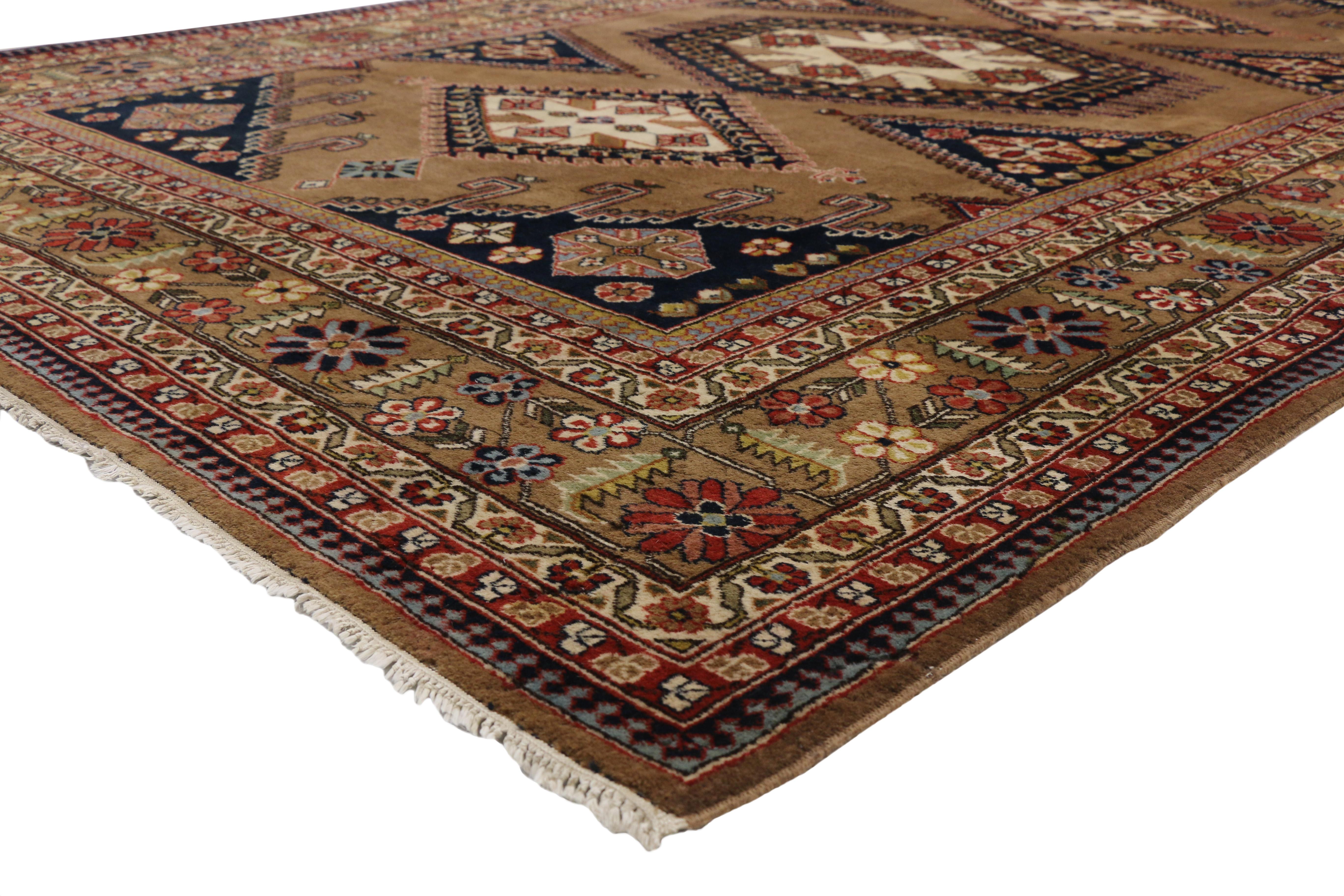 77299, vintage Romanian Tribal rug with Adirondack Lodge style. This hand knotted wool vintage Romanian rug with Adirondack Lodge style features a hexagonal medallion flanked with a lozenge at either end anchored with small diamond pendants floating