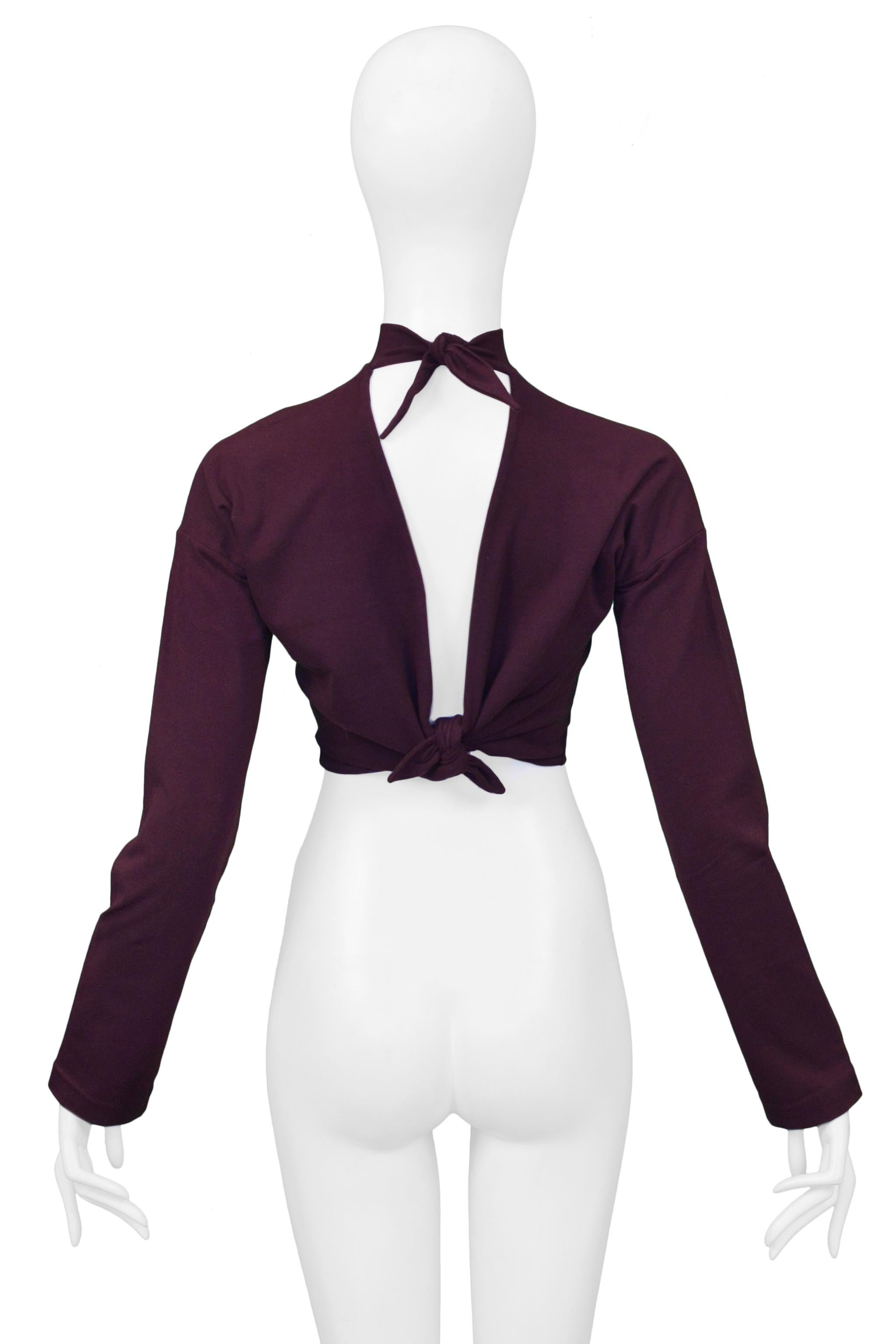 Resurrection Vintage is excited to offer a vintage Romeo Gigli dark purple top featuring long sleeves, high neck, and tie back.

Romeo Gigli
Size 42
Cotton Spandex
Excellent Vintage Condition
Authenticity Guaranteed