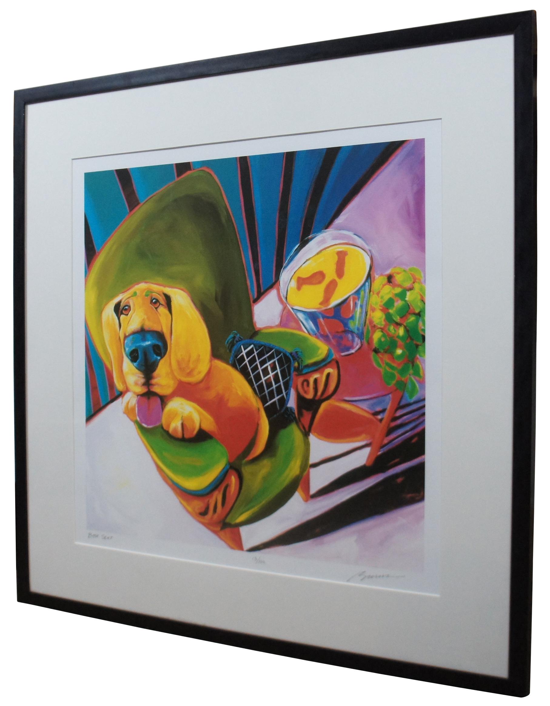 Limited edition whimsical expressionist style lithograph print by Ron Burns titled “Best Seat,” showing a golden dog seated in a green chair; pencil signed and numbered 13/100. “A painter of boldly colored, semi abstract animals, he was the