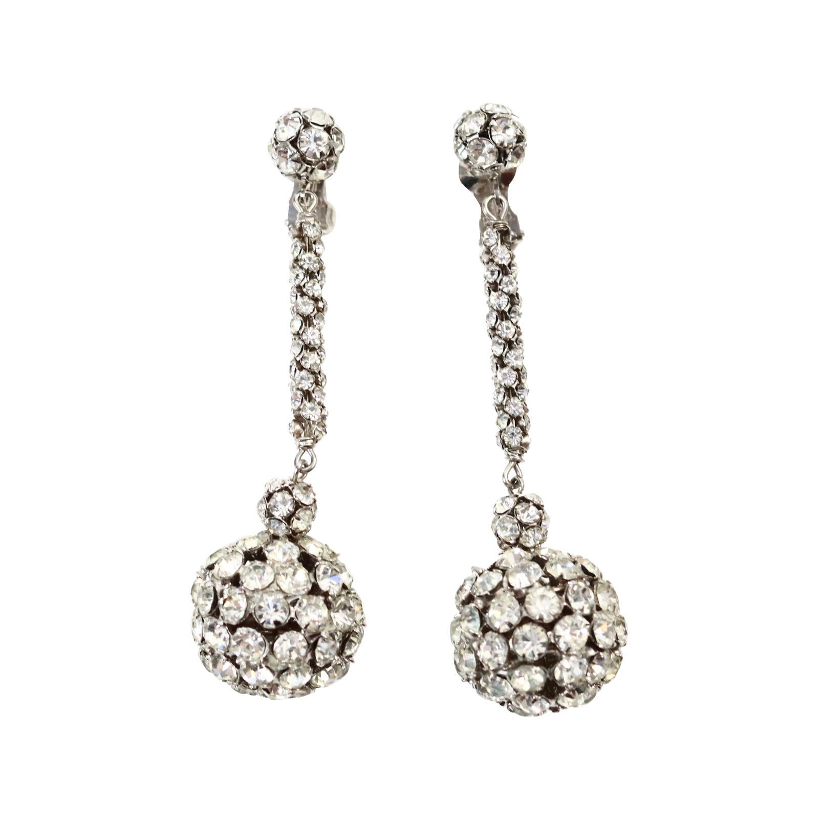 Vintage Rondell Dangle Ball  Earrings Circa 1960s. These earrings just bring a smile to my day. They are so well made and just spectacular.  There is  a larger rondell ball at the bottom that then has a rondell ball on top of that that is joined by