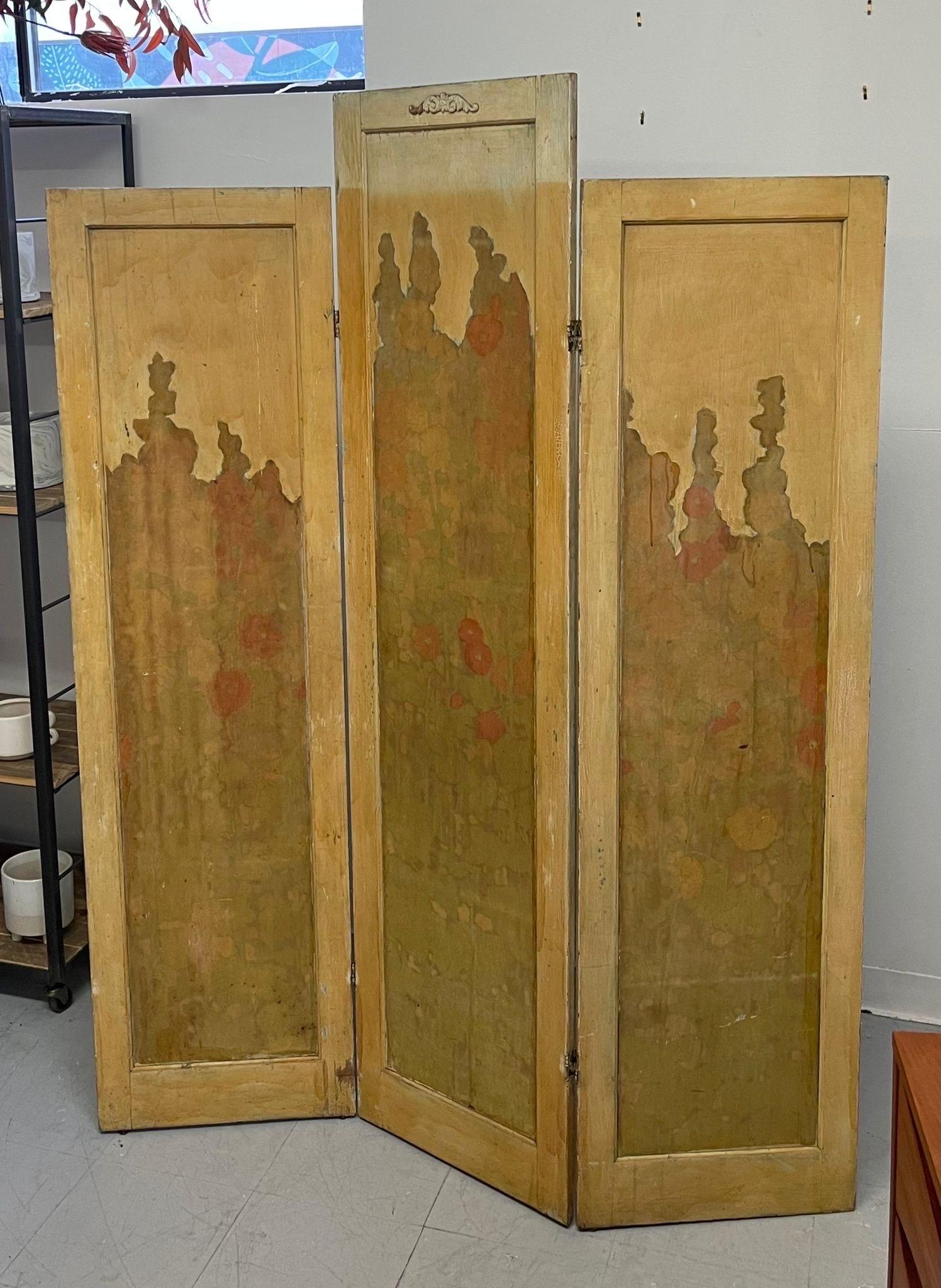 Three Pane Room Divider , Painted Green on one Side with a Floral Motif on the Other. Edges are Yellow , the Top of the Middle Pane is White, Probably From Exposure to the Elements Over Time.

Dimensions. 54 1/2 W ; 2 D ; 72 H