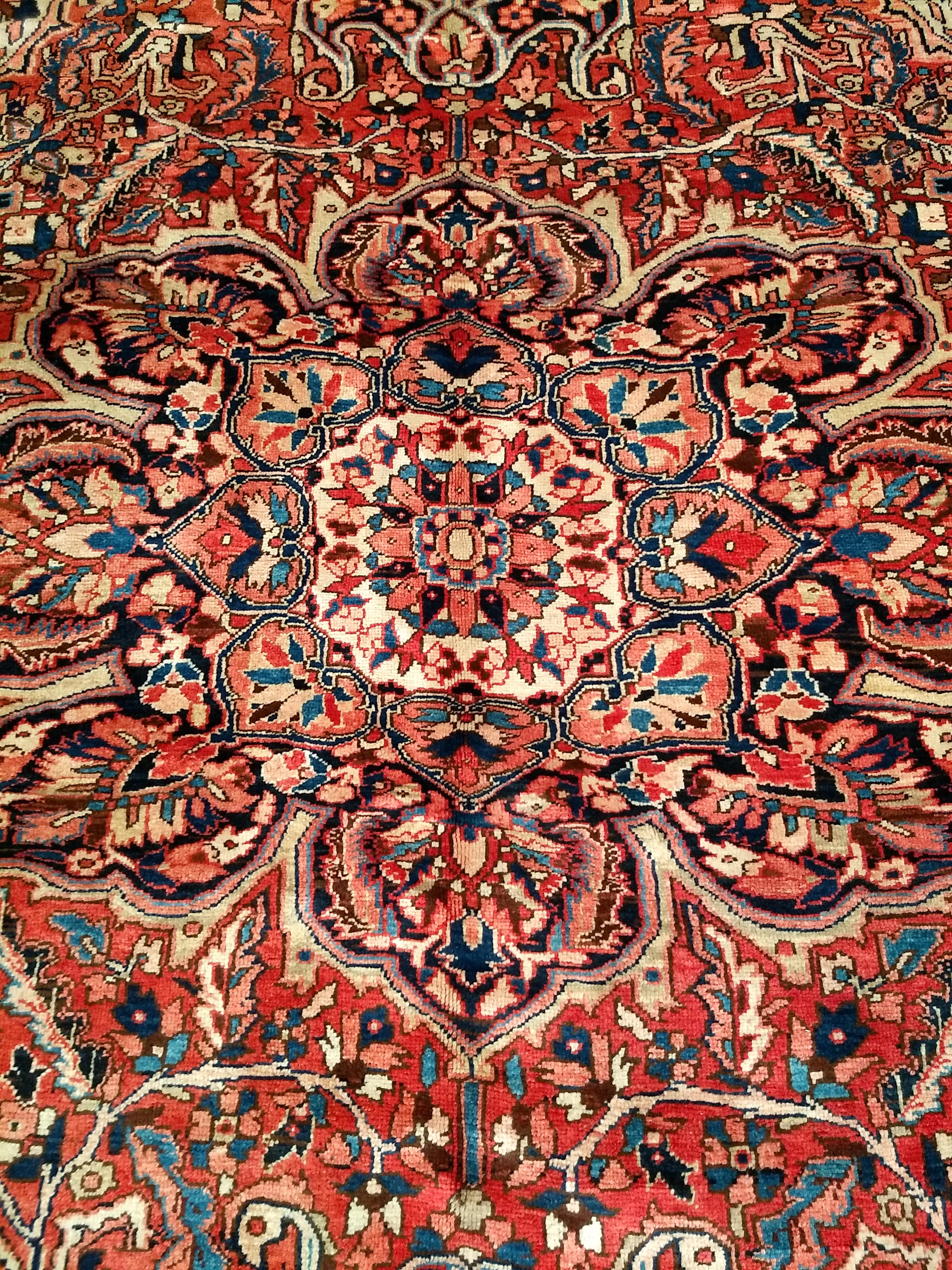 Vintage Room Size Persian Heriz in Rust Red, Ivory, Yellow, Pink, Blue, Navy In Good Condition For Sale In Barrington, IL