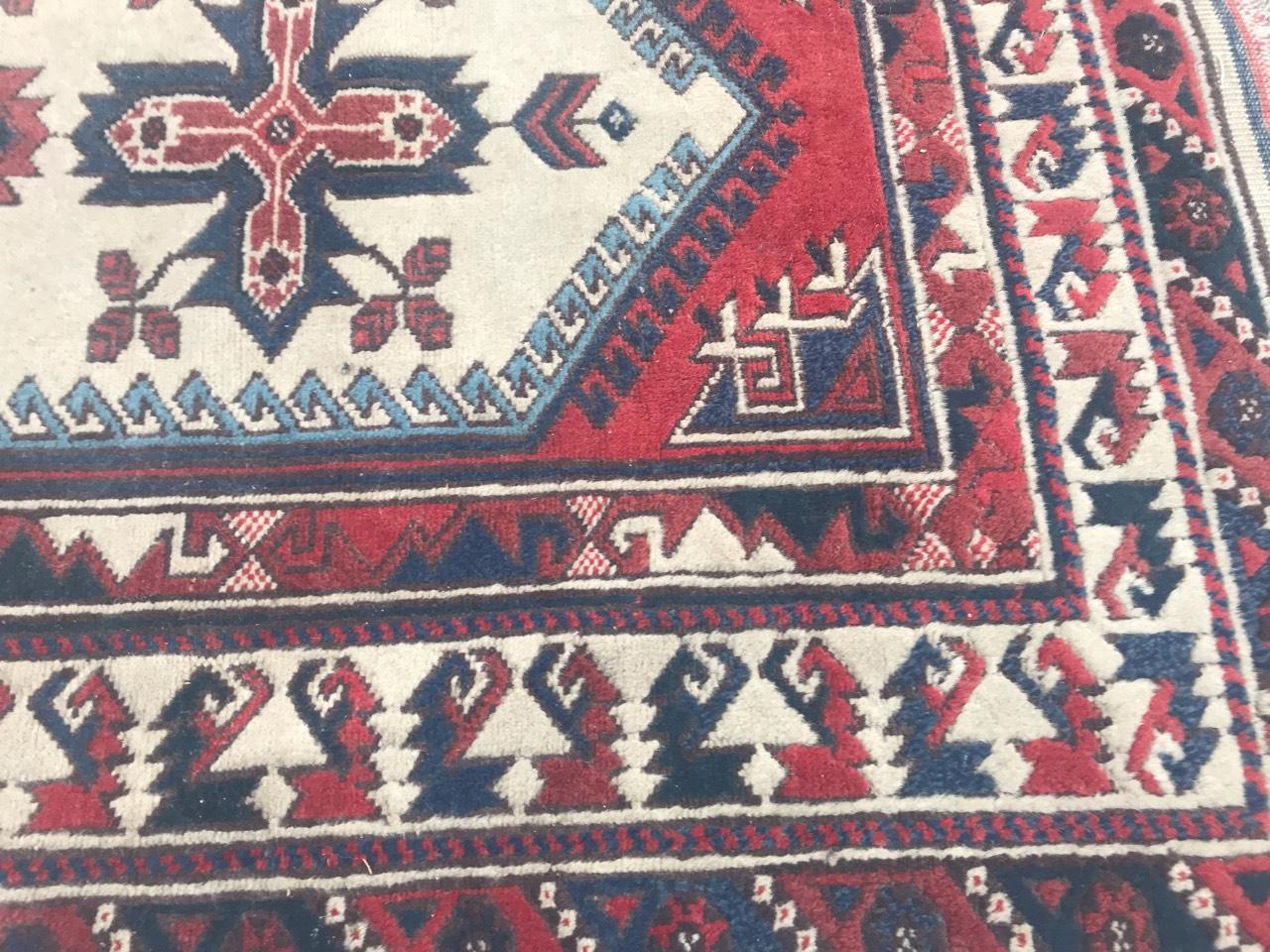 Beautiful late 20th century Turkish rug with a nice geometrical design and nice colors with blue, purple, green and red. Entirely hand knotted with wool velvet on wool foundation.