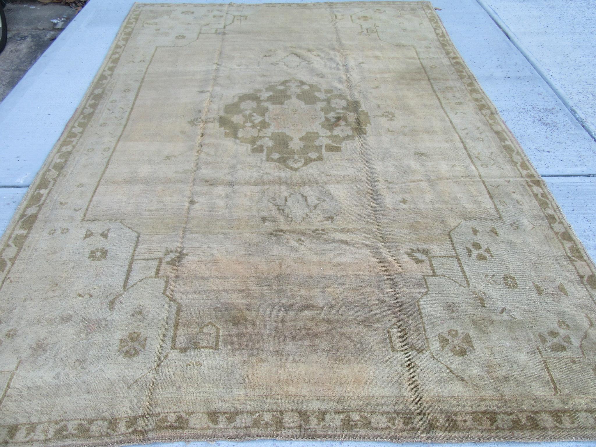 This is a beautiful and finely knotted room size vintage Turkish Kars rug antique washed for softer colors. The rug measures 8' x 11' 6'' and is in great condition.