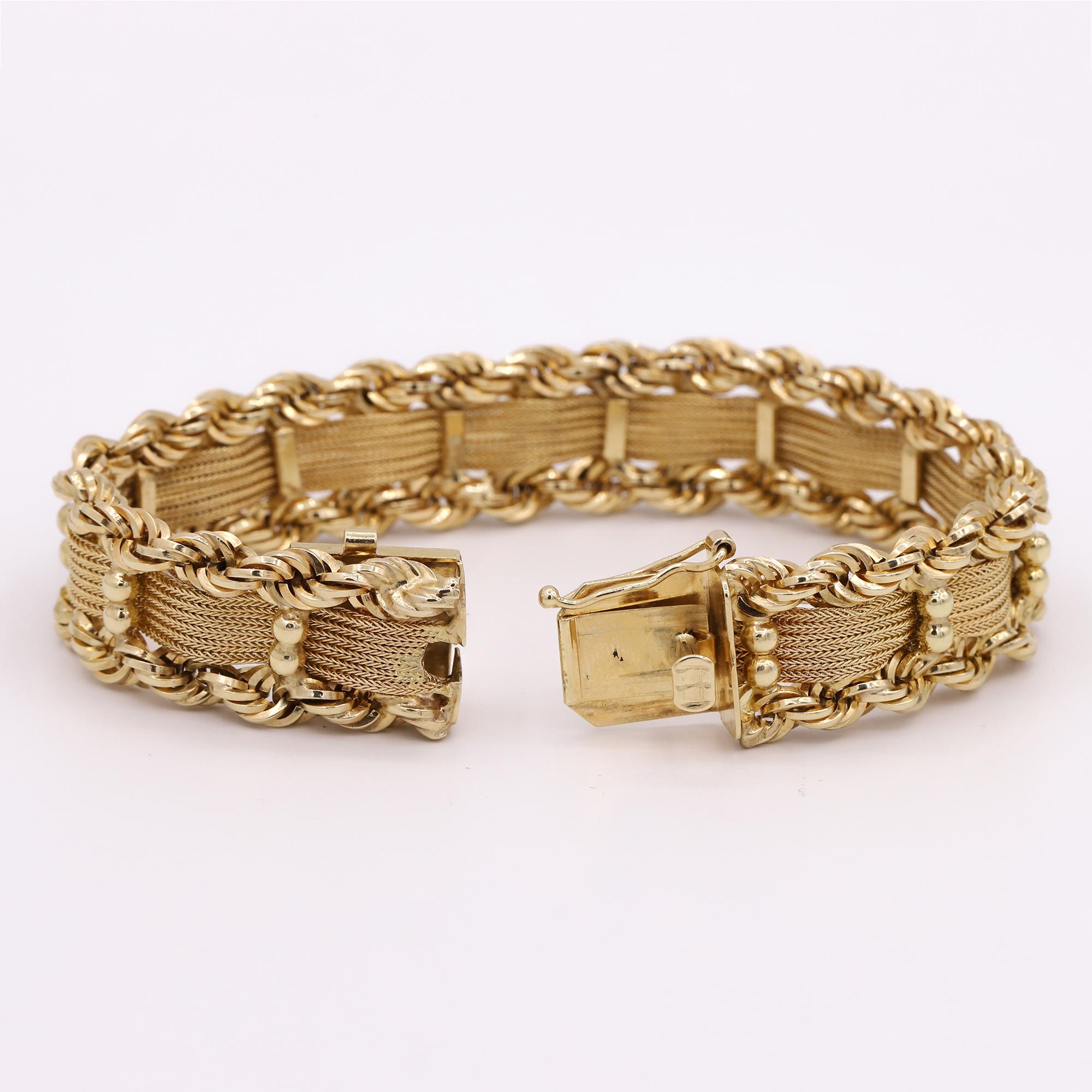 A beautiful vintage 14 karat Yellow Gold bracelet with different Rope textures & styles. Centered throughout the bracelet is a subtle golden weave design. Lastly, in alternating sections for security and style, are a multi-sphere section.

This