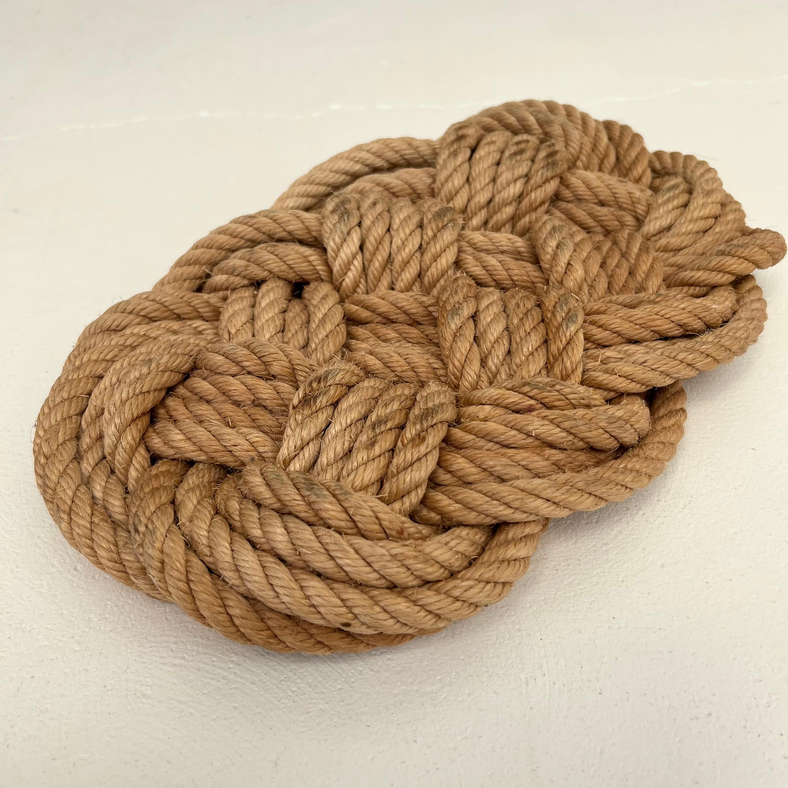 Circa 1960 vintage French rope hot plate in the style of French-Swiss husband-and-wife duo Adrien Audoux and Frida Minet. 

Known for their playful and unique modernist designs, Audoux and Minet adopted a rustic style in their work, integrating