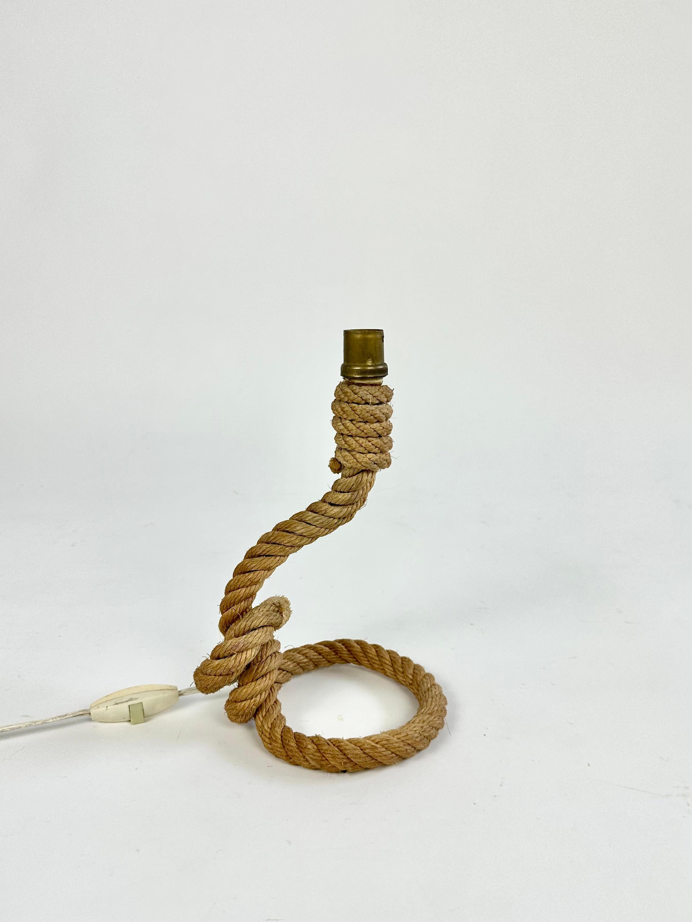 Vintage rope table lamp by Audoux & Minet, France c.1950

In original as found condition, sourced from rural France. A good, clean example in working order

Lamp base only. 

No damage or fraying to the rope. Original switch and wiring (short wire,