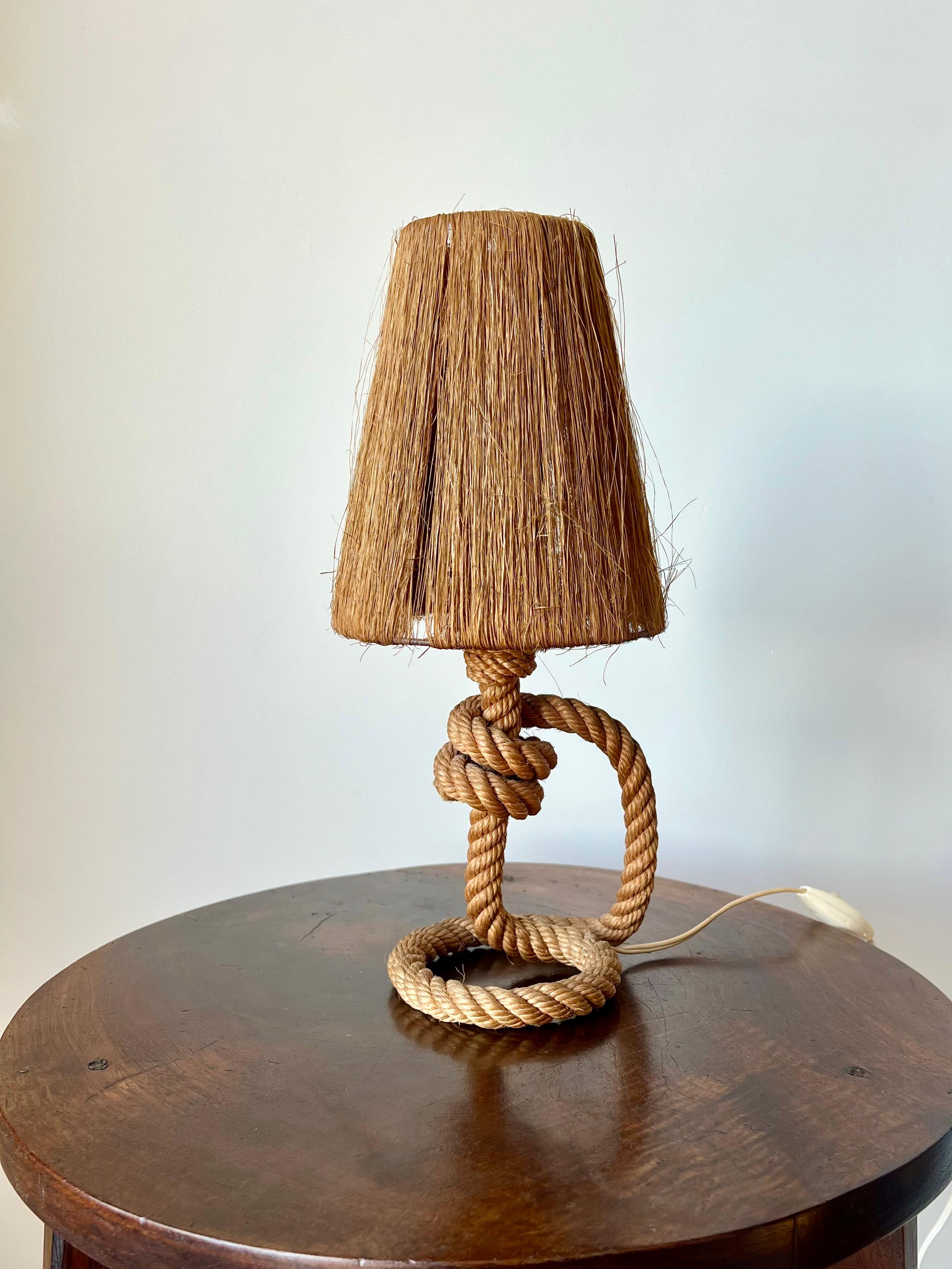 Lovely small vintage rope table lamp by Audoux & Minet, France c.1950

A nice, clean example in working order supplied with the original shade.

In original condition. No damage or fraying to the rope. Original switch and wiring checked and in good