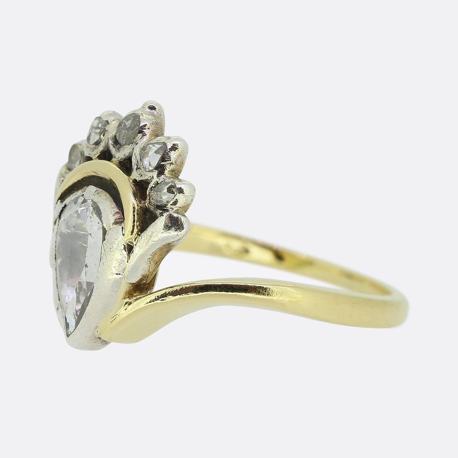 Here we have gorgeous natural rose cut diamond ring. The focal stone here is rub-over set in silver and topped with a crown consisting of five rose cut diamonds. This centralised motif is cradled by a plain 14ct yellow gold band. 

Condition: Used
