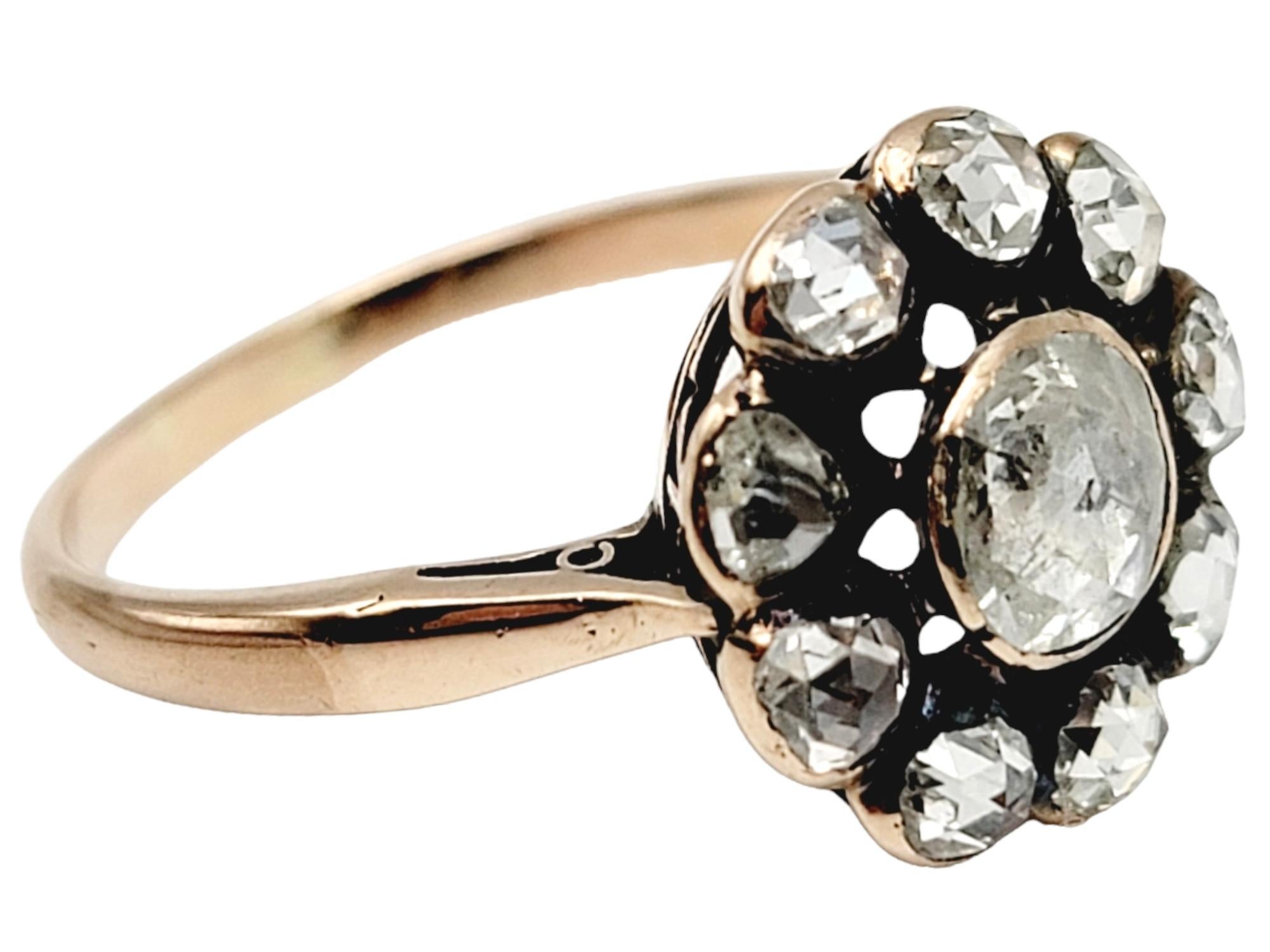 Ring size: 8

Take a trip back in time and discover this incredible vintage rose cut diamond cocktail ring. This dreamy, romantic piece features a sparkling diamond halo surrounding the gorgeous faceted center stone.  Offset by a delicate shank, the