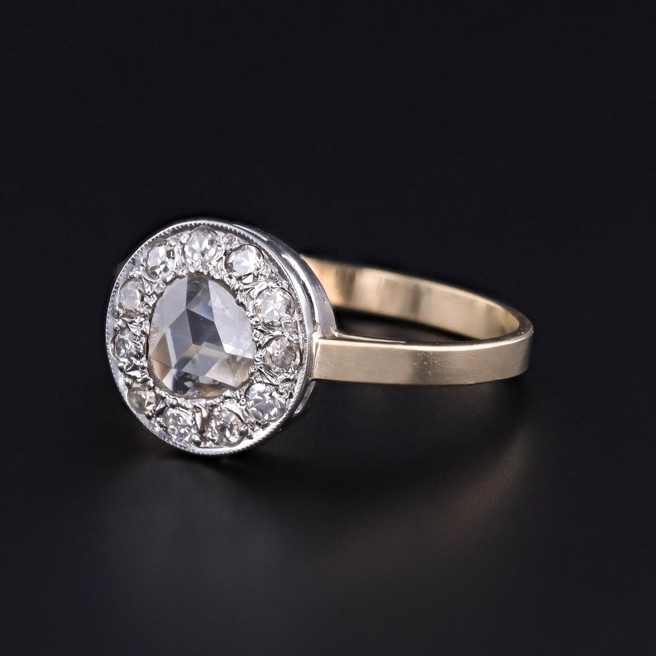 Bague Vintage en or blanc rhodié 18k et or jaune 14k avec diamants taillés en rose et en grappe

Mélange gracieux d'élégance vintage et de savoir-faire contemporain, cette bague bicolore est ornée d'une grappe de diamants provenant d'une paire de