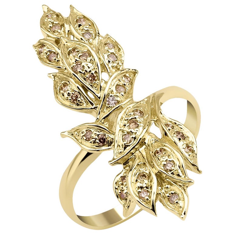 Bague vintage en or rose, diamant couleur champagne, motif floral