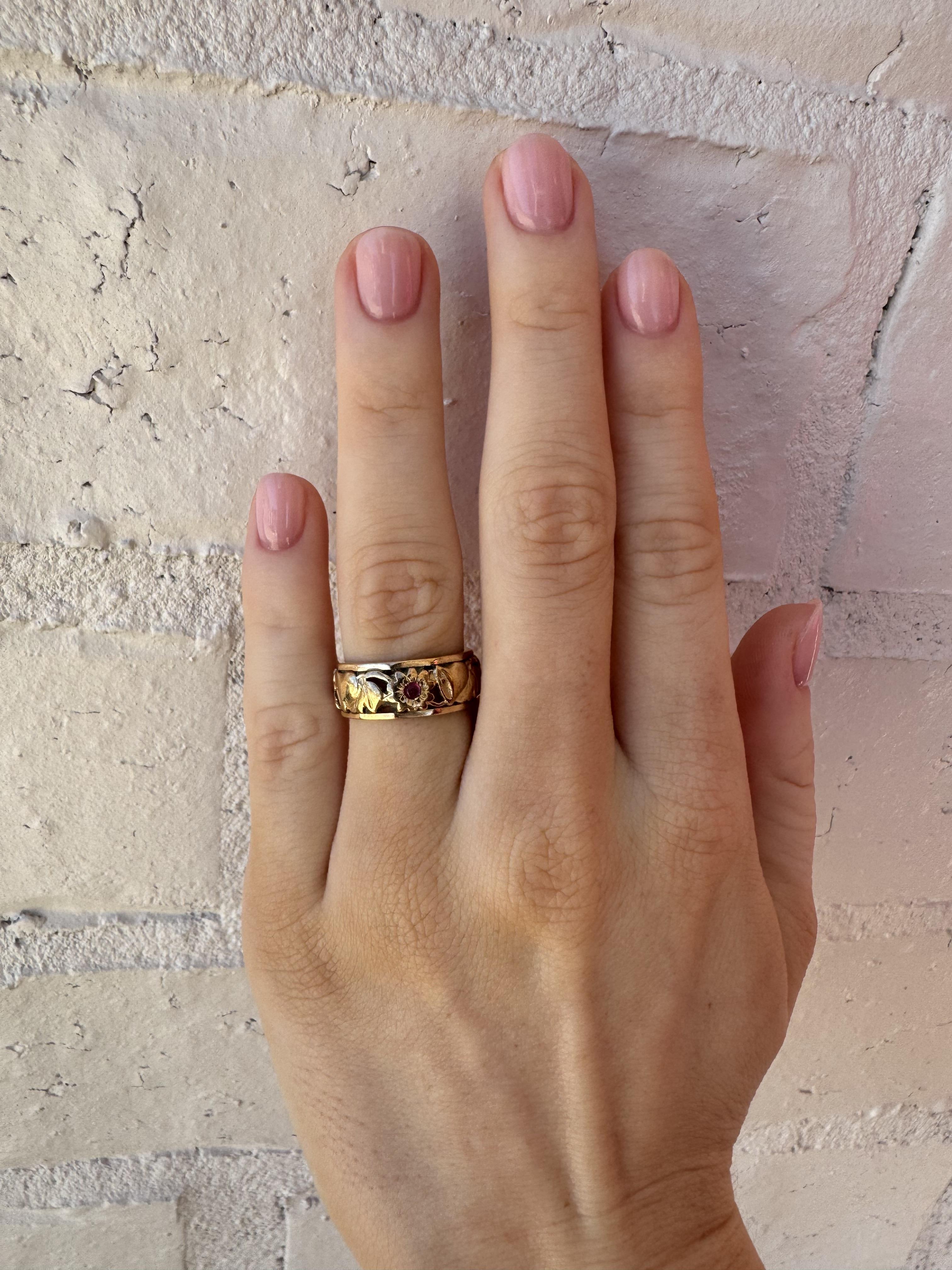 We are loving this unique band!!
Great detail & beautiful rose gold color.

Band Details
Material: 14K Rose Gold
Era: Victorian 1840 - 1900
Width: 7.4mm
Weight: 4.5 Grams
Finger Size: 5
Unfortunately this band can not be sized

Accented by the