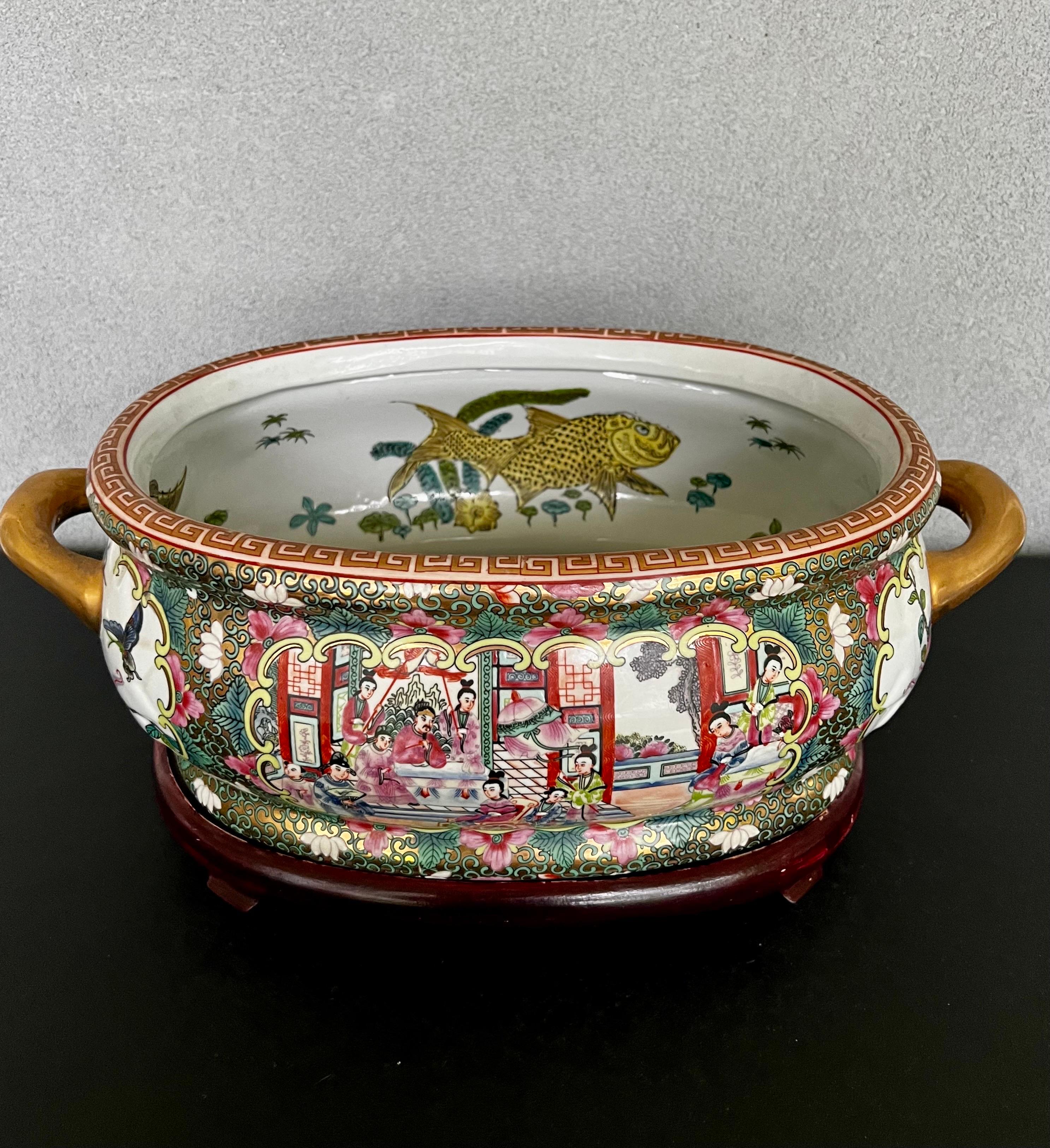 Stunning vintage Rose Medallion Hand Painted Porcelain Footbath with wooden stand.  
This footbath has been beautifully painted with pink, green and gold being the primary colors, it’s beautiful and would be an statement piece in your home, you can