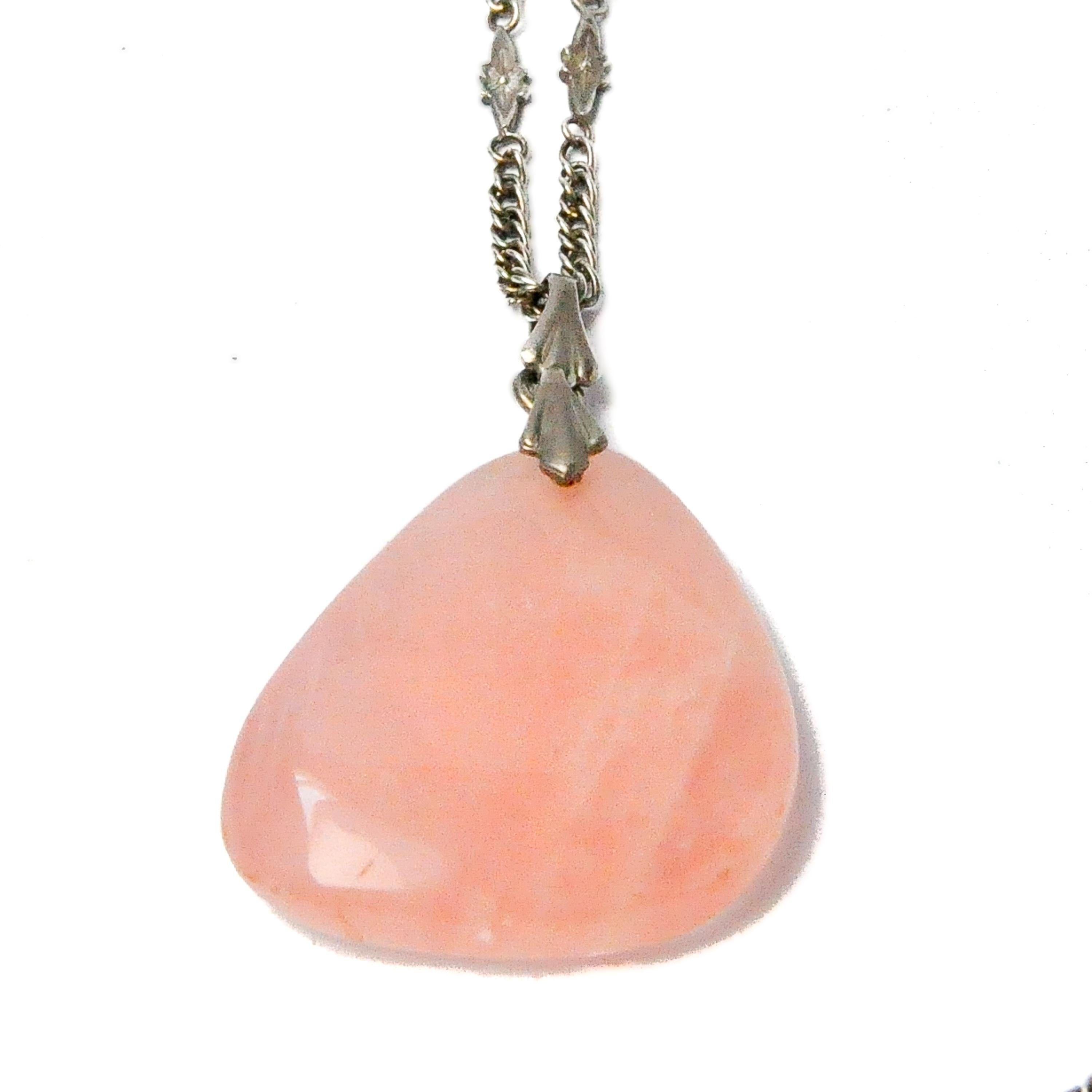 Rose quartz is pre-eminently the stone of the heart and love. It has a strong effect on the heart chakra and opens the heart to receive love and to give love. This lovely and large rose quartz gem on a silver chain necklace pendant will radiate and