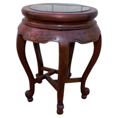 Mesa auxiliar vintage tallada en palisandro con tapa de cristal ahumado